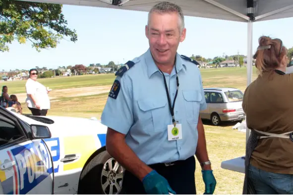 <p>Senior Constable Peter Gray of Whanganui police, pictured in 2015 at a children's event. Photo: NZME</p>\\n