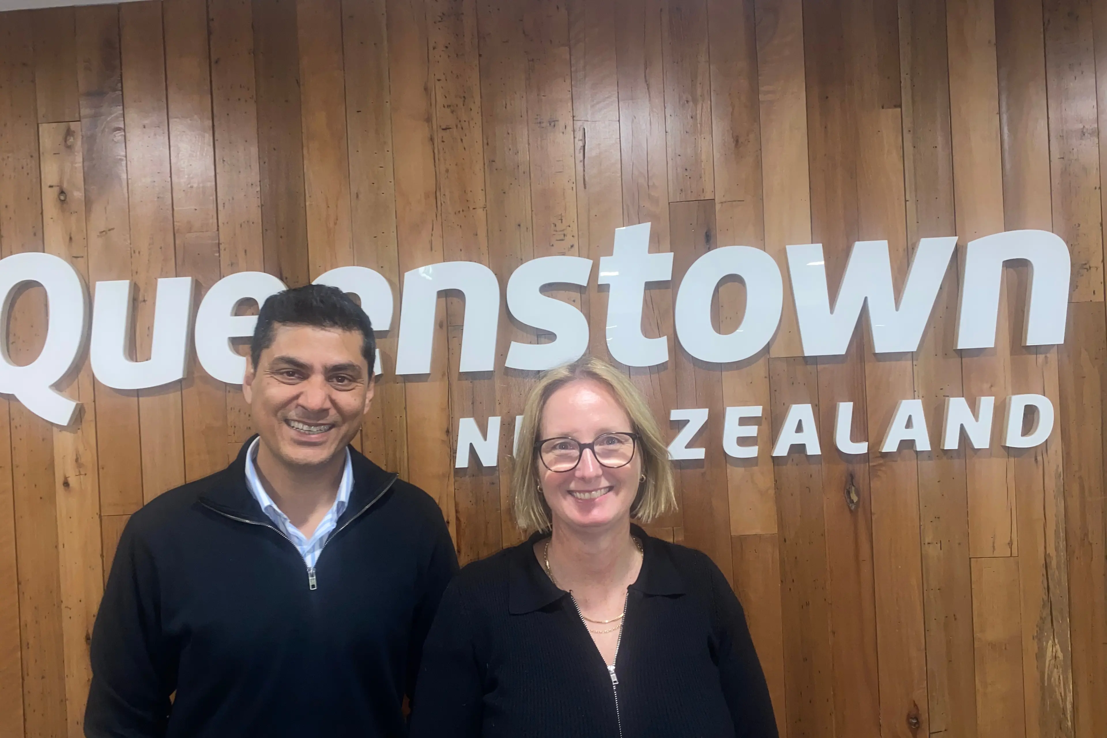 Tech breakthrough: Technology Queenstown CEO Sarah Russell with ZUZU Hospitality founder/CEO Vikram Malhi whose Singapore-based company\\u2019s piloting\\u00A0its new AI accommodation platform in the resort. Photo: Philip Chandler