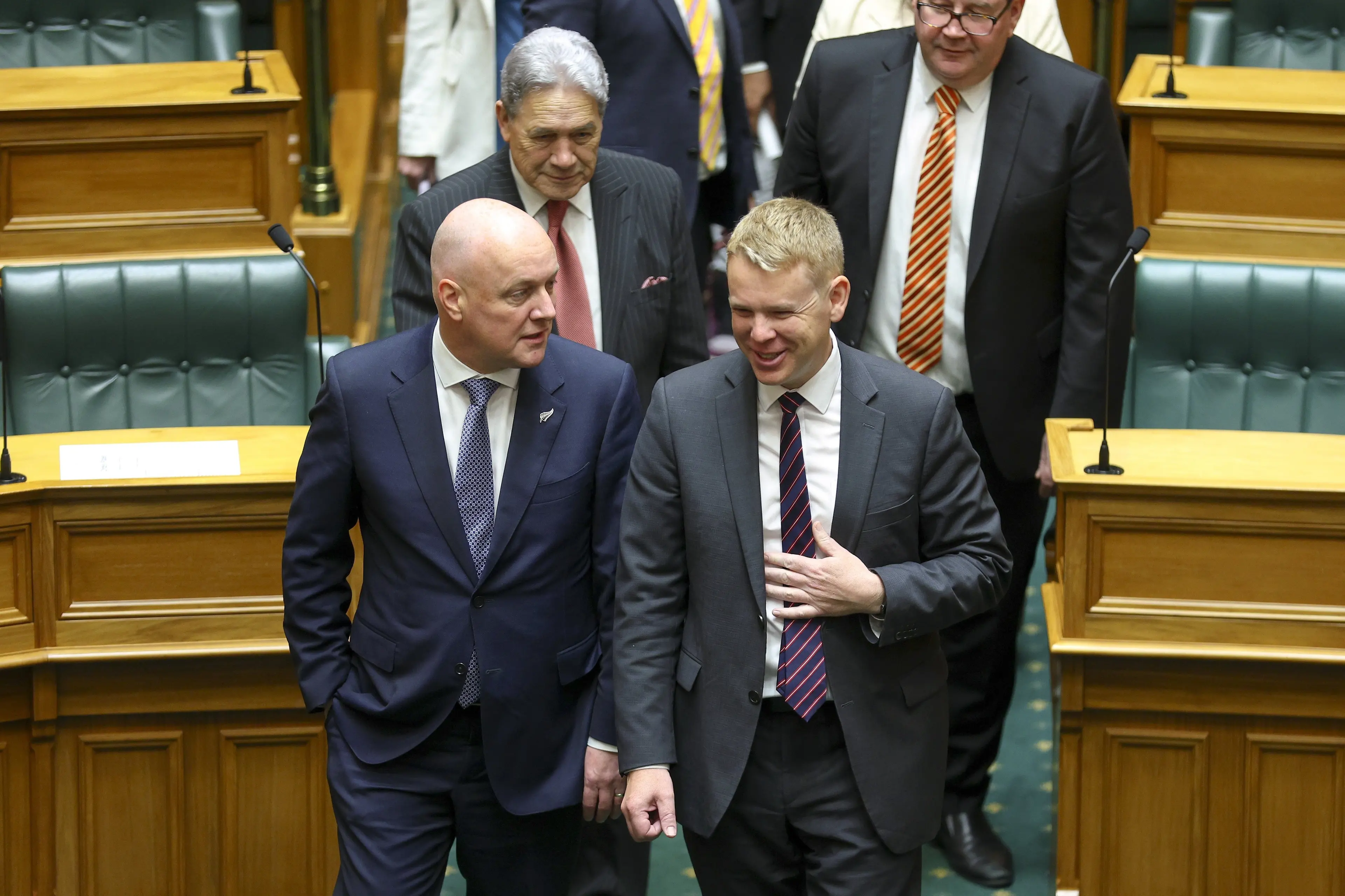 Prime Minister Christopher Luxon talks to Labour leader and former Prime Minister Chris Hipkins. PHOTO: GETTY IMAGES