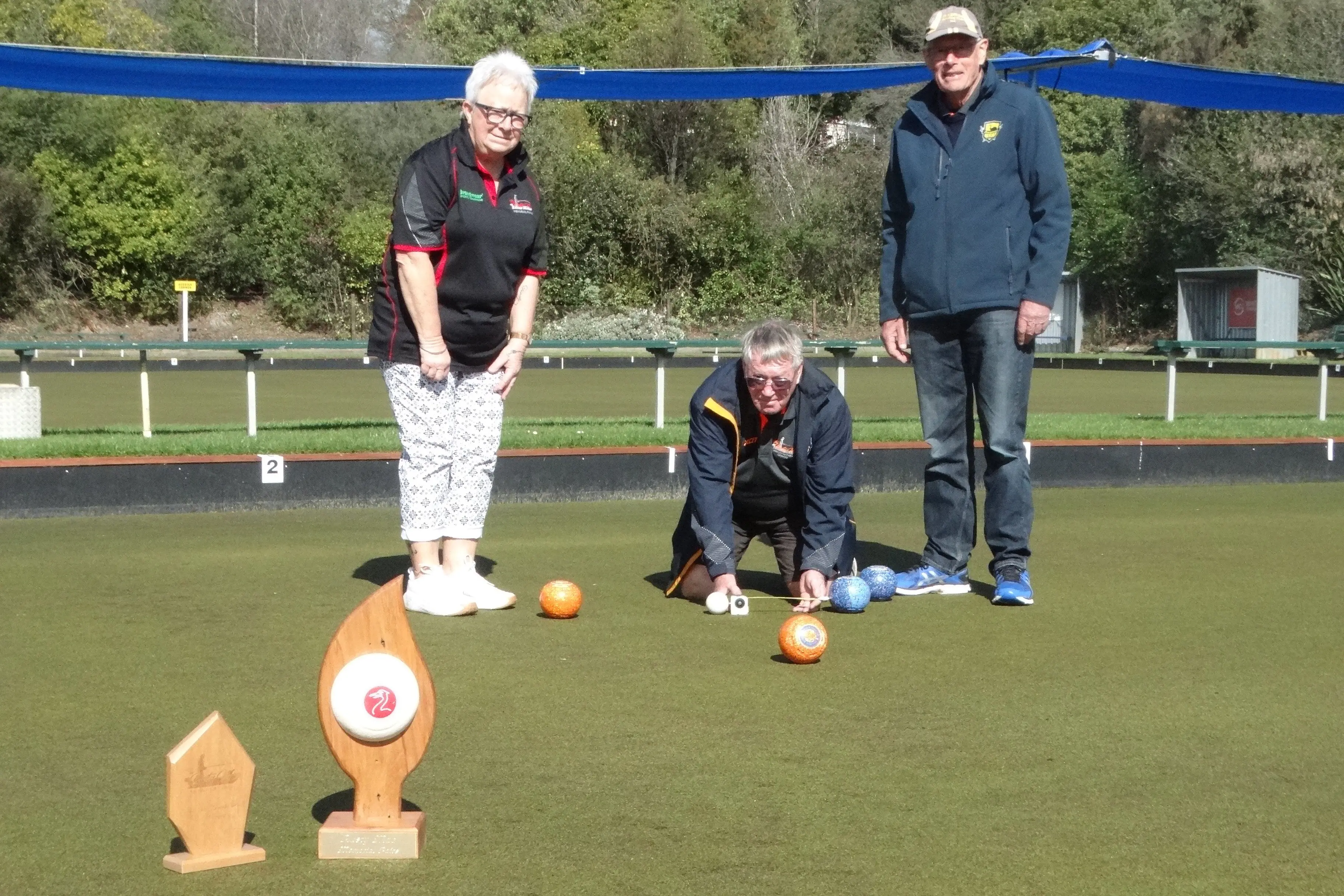 Awamoa Bowling Club will host the Rusty Mac Memorial Bowls Tournament starting today which (from left) Annie McDonald, tournament controller Terry Lake and president Bob Kingan are looking forward to. Photo: Nic Duff