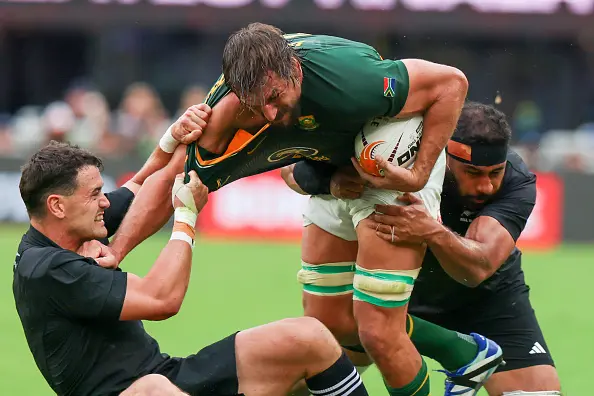 All Blacks Will Jordon (left) and Patrick Tuipulotu try to take down Springbok lock Eben Etzebeth in Baltimore. Photo: ISI Photos via Getty Images)