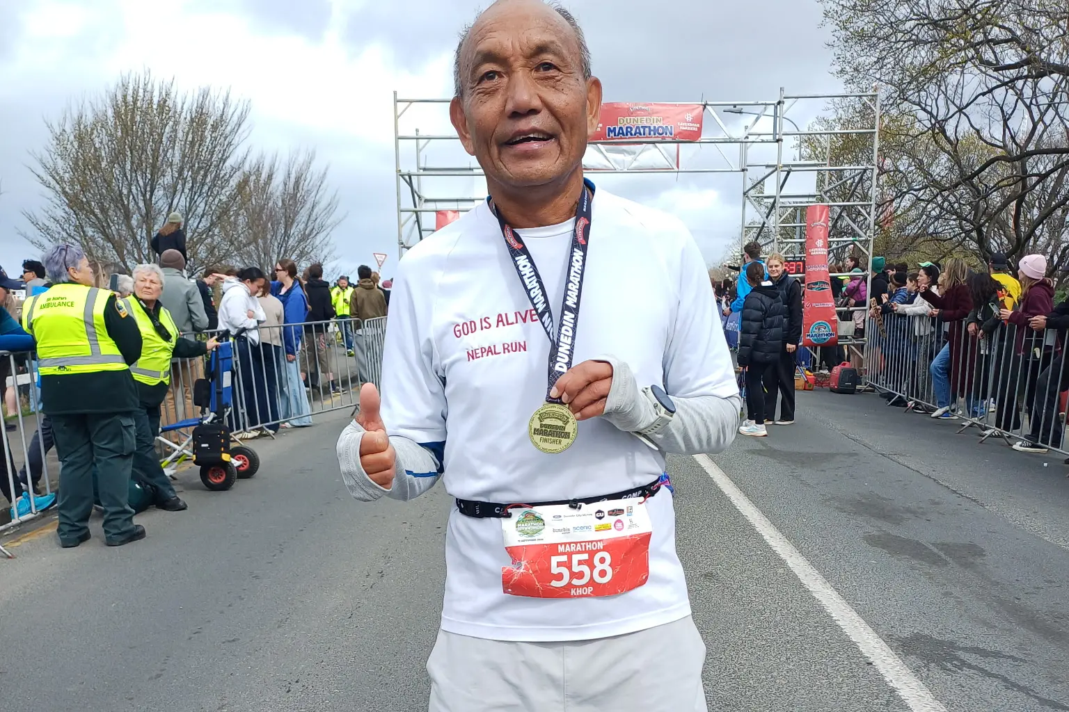 Khop Bahadur Gurung raises a half century of marathons. Photo: Wayne Parsons