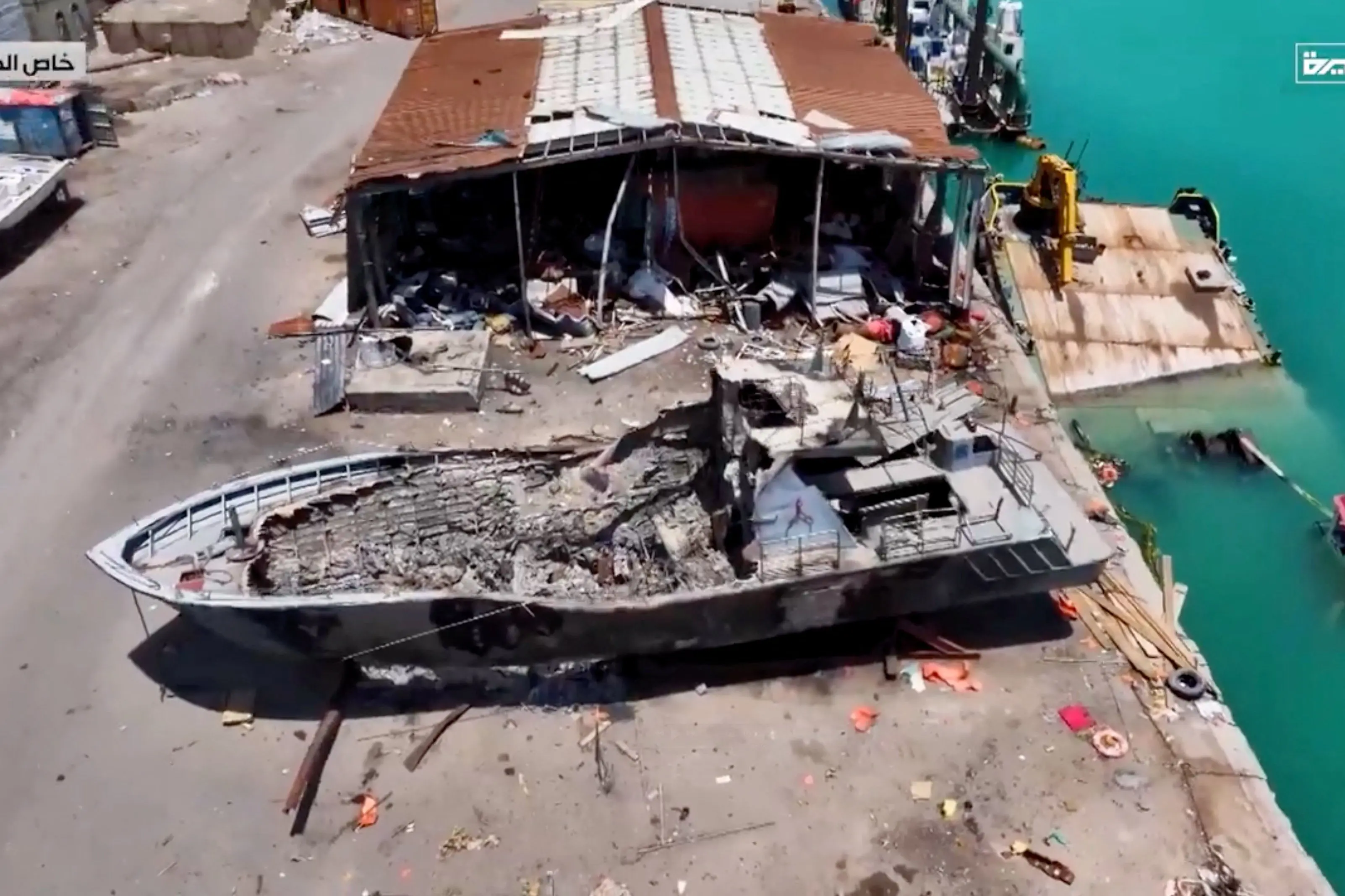 <p>An aerial view shows a damaged boat, as Iran-aligned Houthis seized control of Yemen's port city of Mocha, Yemen. Photo: AL MASIRAH/Handout via REUTERS</p>\\n