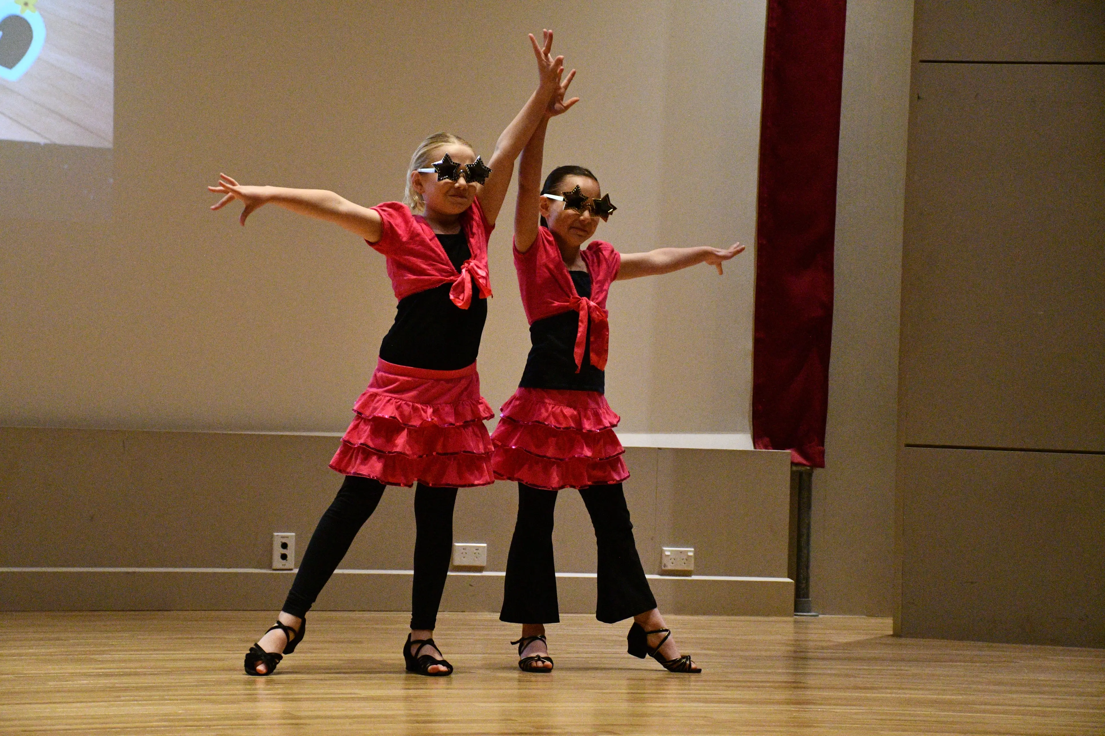 Eccentric mega star Elton John is the inspiration for dancers Marlee Hart (left) and Tasman Bailey, both 8 and of Gore, in an energetic group number for their studio\\'s showcase which will take place this weekend. Photo: Gemma Sinclair