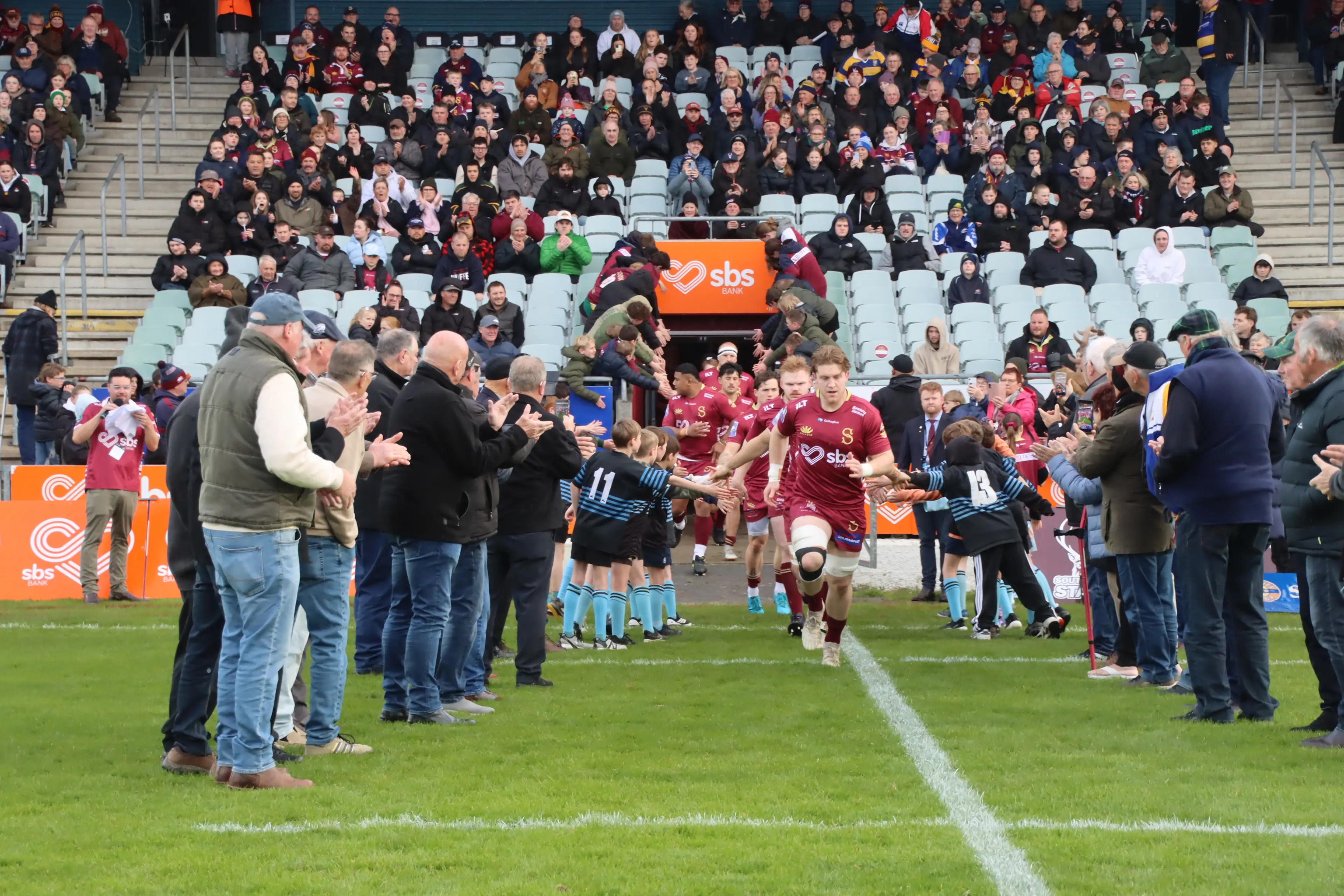 Former Southland rugby players from the 1970s and 1980 attending a reunion at the weekend, form a guard of honour for the Southland Stags before Sunday\\'s match against the Bay of Plenty. Photo: Sandy Eggleston
