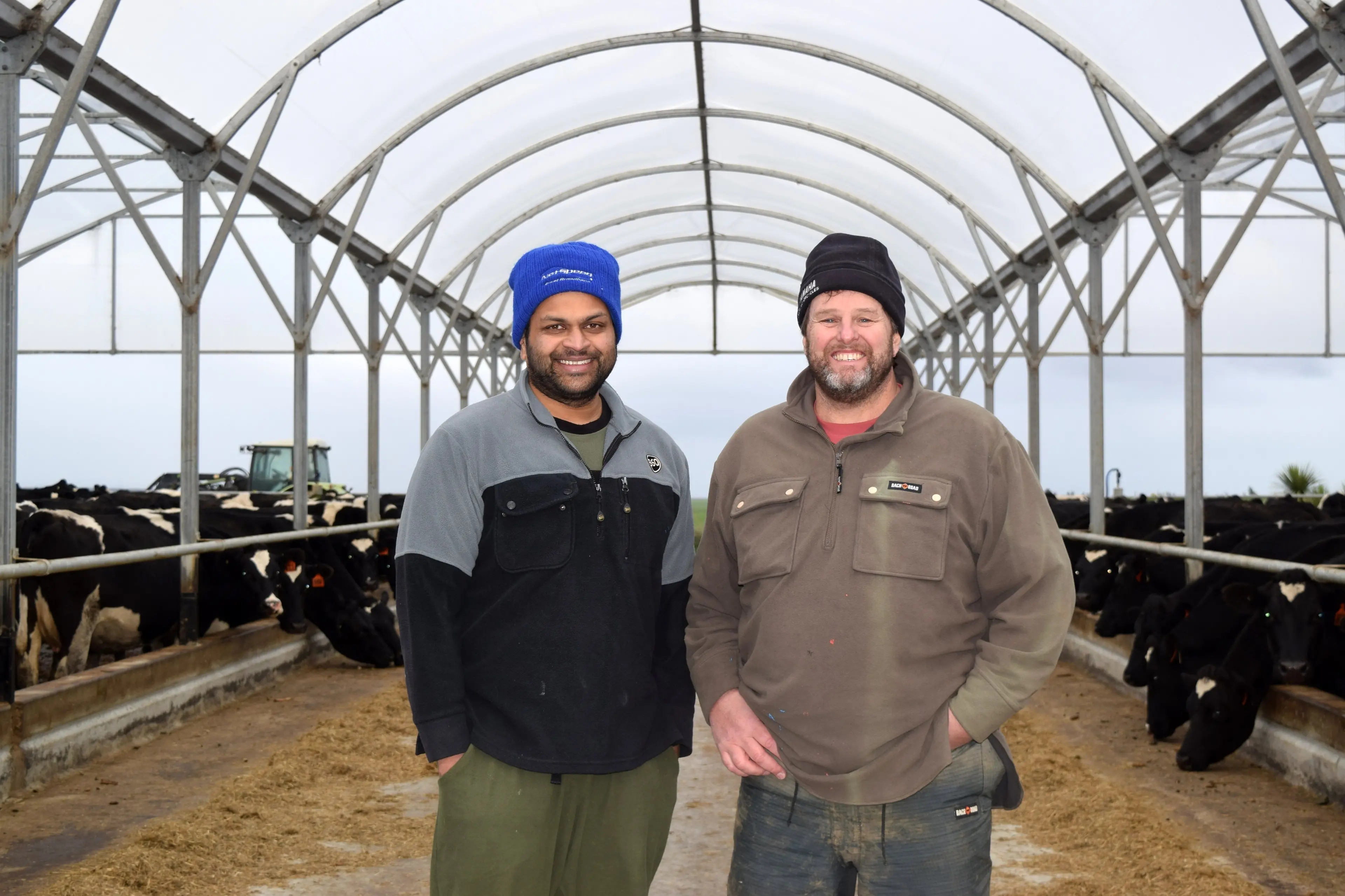 In a wintering barn in Kapuka in Eastern Southland are dairy farm business DuoReges contract milker Sameera Manage (left) and co-owner Justin Koenig. Photo: Shawn McAvinue