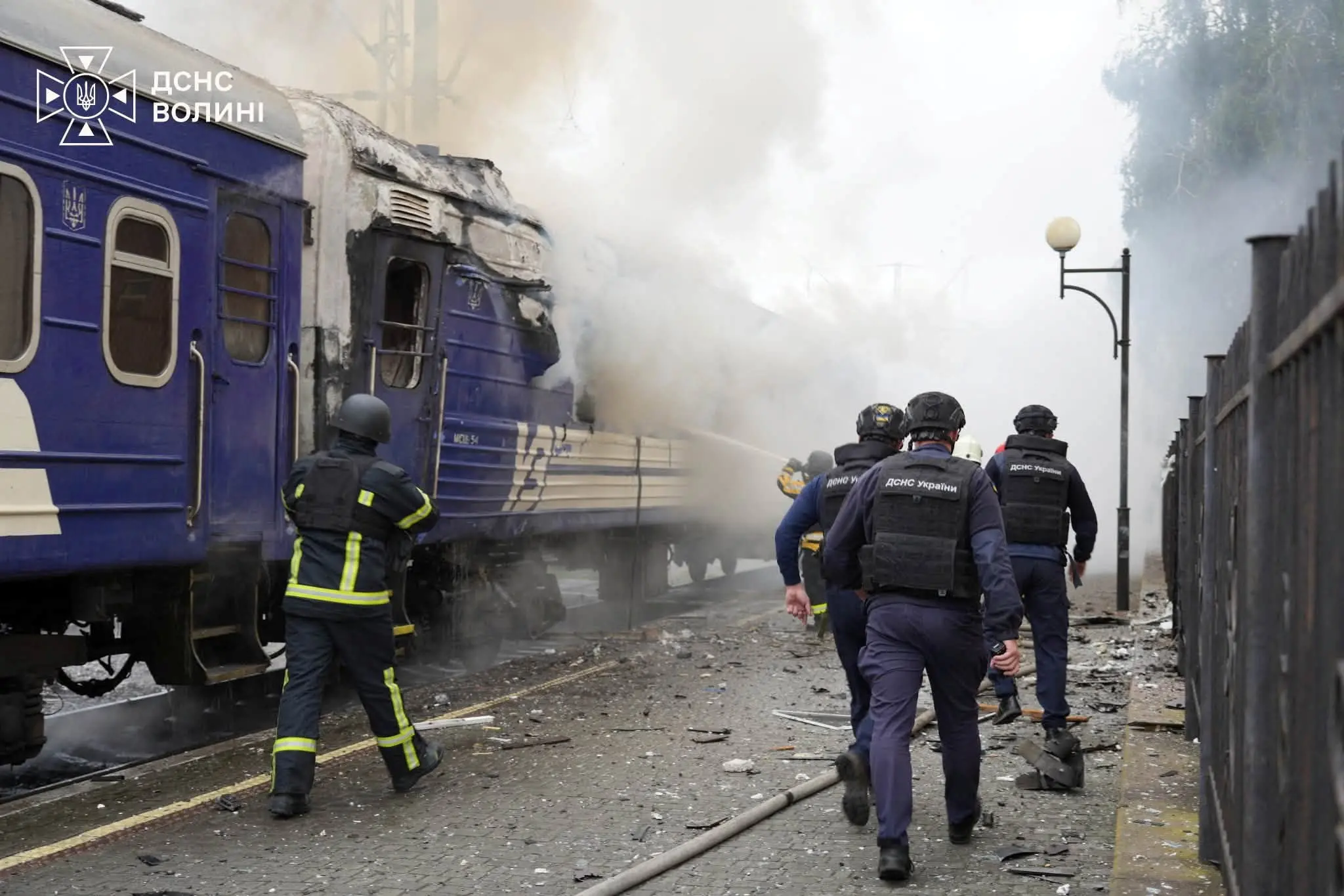 <p>Firefighters extinguish a car of a passenger train hit by a Russian drone strike at a railway station in Lutsk, Ukraine. Photo: State Emergency Service of Ukraine via Reuters </p>\\n
