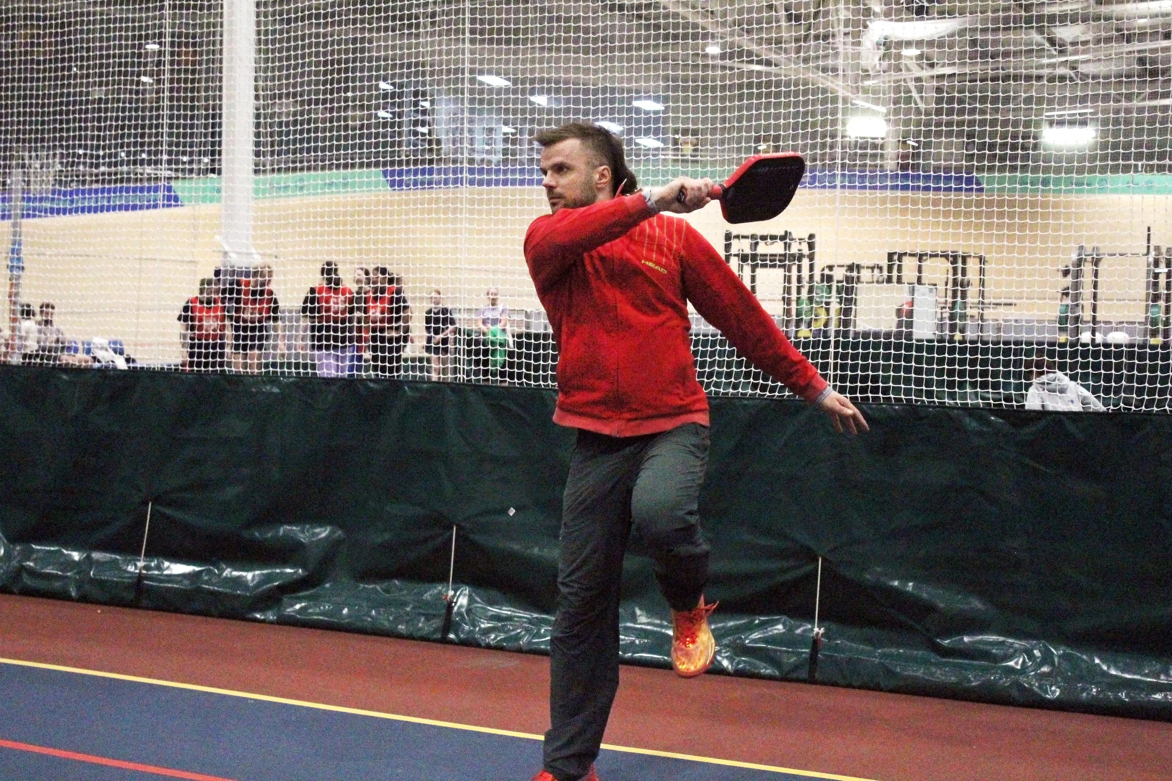 Southern Slammers organiser Marcin Lipski serving the pickleball straight over the net at ILT Stadium. FILED