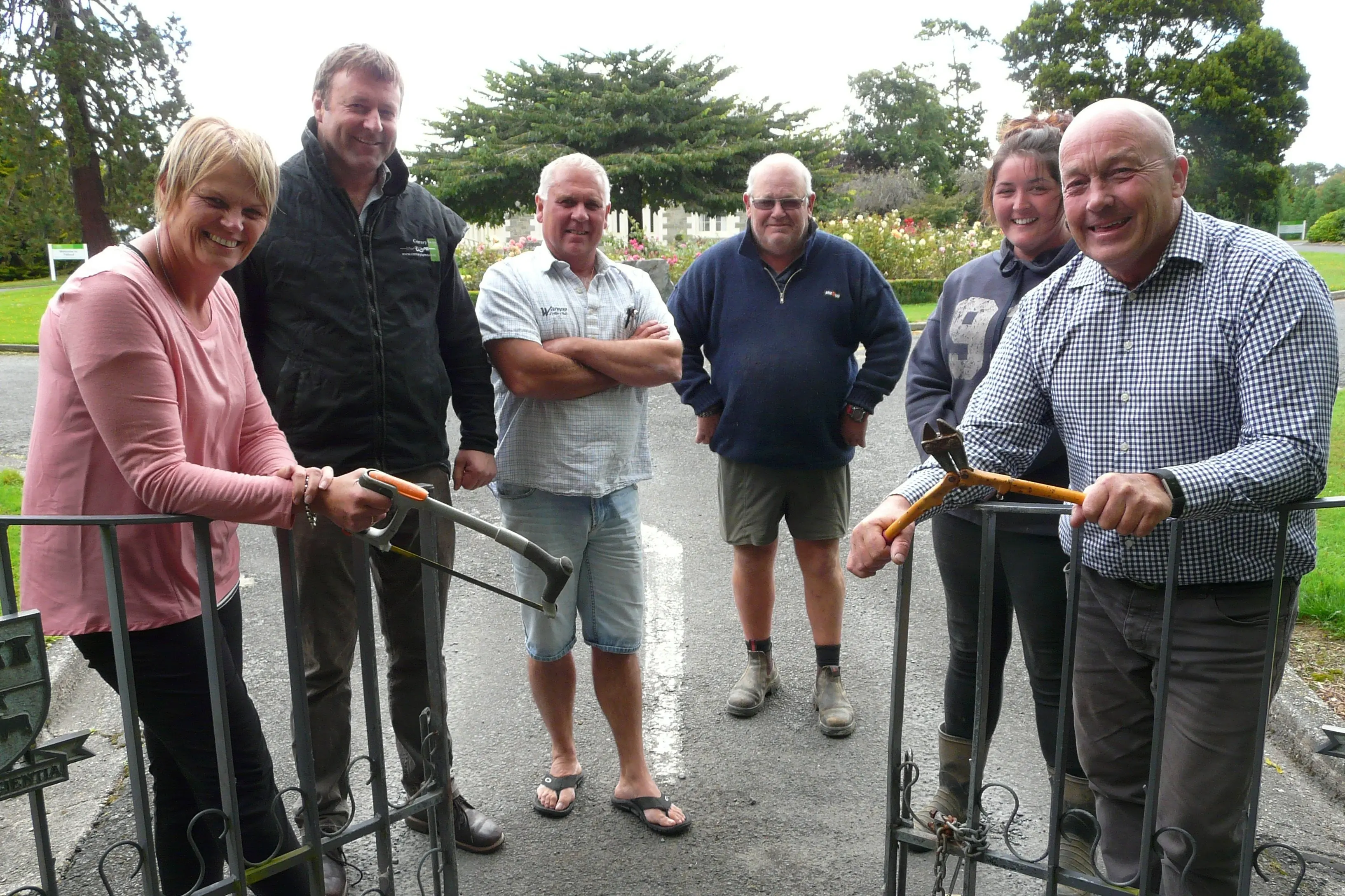 Then Telford staff and advocates, in February 2019, after receiving news of a one-year reprieve from closure, from left, Lisa Snell, Mark Patterson MP, Ken Payne, Alister Ward, Soroya Grant, and Clutha Mayor Bryan Cadogan, show their delight at opening the gates to students once again. Photo: Richard Davison