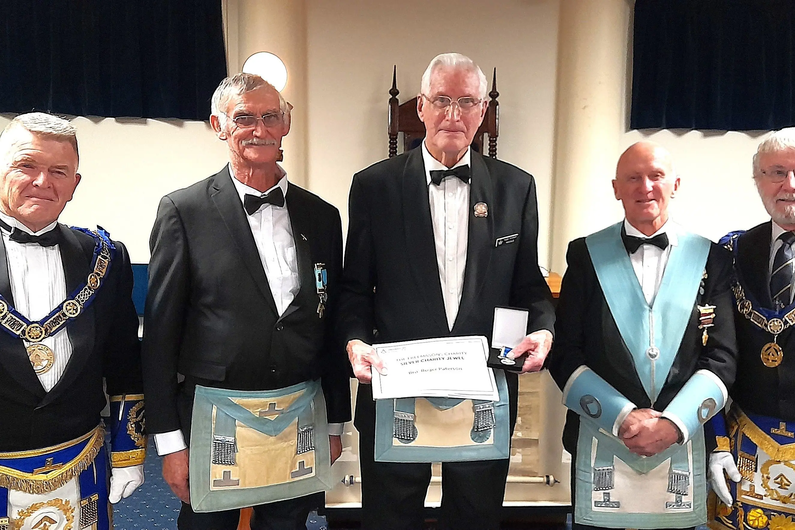 Thistle Masonic Lodge member Roger Paterson, centre, received his Silver Charity Jewel, from left, Grand Superintendent of Canterbury Don Baron, John Handy, Master of Thistle Lodge Merv Green and divisional Grandmaster Allen Glasson. Photo: Supplied