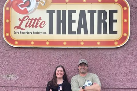 Gore Repertory Society production director Olivia Crawford and president Sean Burke, outside their base at the Gore Community Centre in Richmond St, are keeping the show on the road ahead of the group\\'s 90th birthday. Photo: Supplied