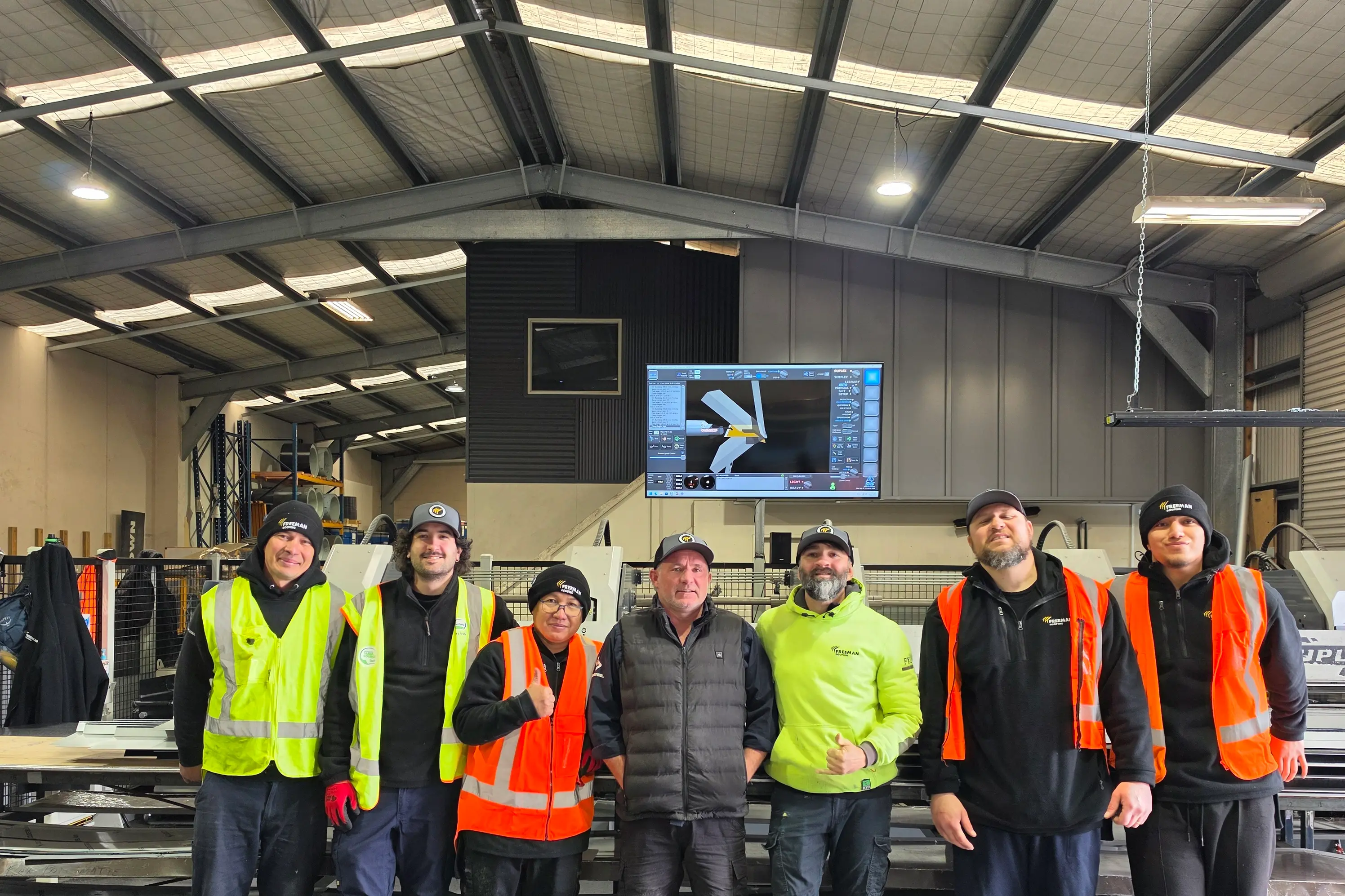 In the mix: Freeman Roofing Queenstown branch manager Brad Rule, centre, pictured with some of his team. Photo: Supplied