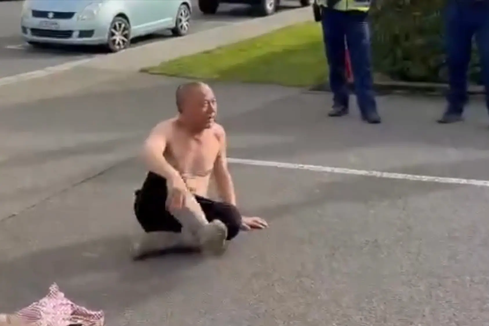 On Monday, Eddie Zhi returned to Environment Southland where he removed clothing in protest against the council. Credit: Screenshot.