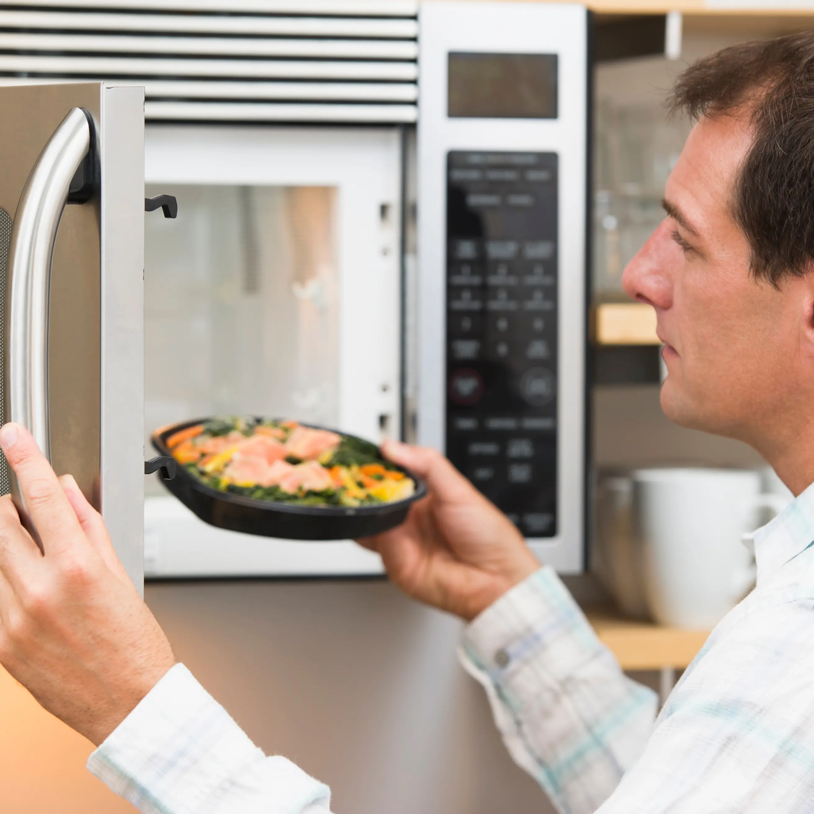 Why does microwaving fish smell so bad?
