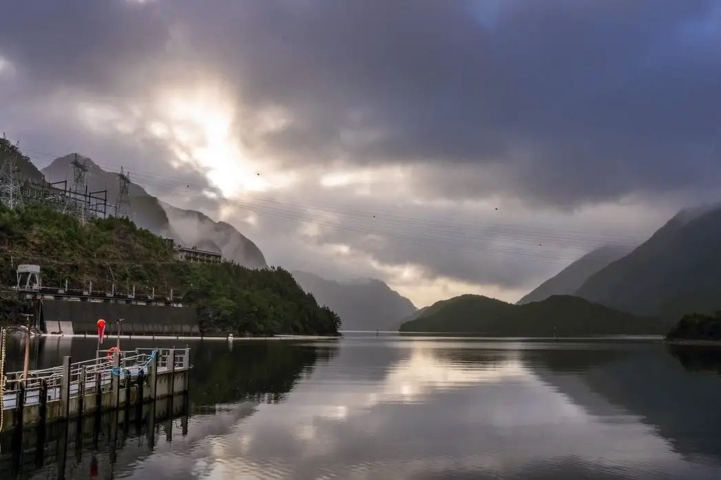 The Manapouri power station intake, Lake Manapouri, under some threatening skies. Photo: Meridian Energy