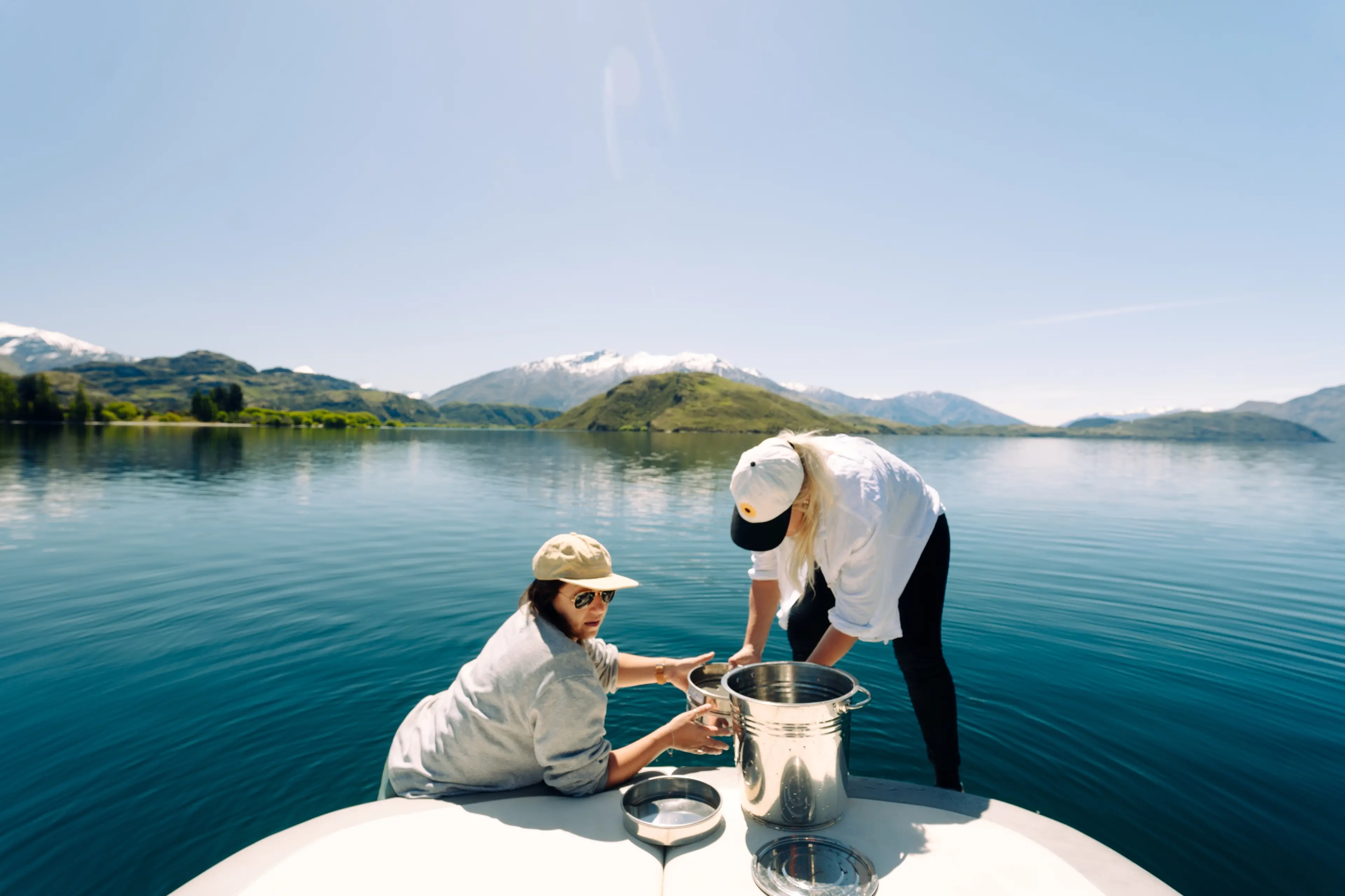 WAI Wanaka researchers gather water samples from Lake Wanaka to test for the presence of microplastics. Photo: Supplied.