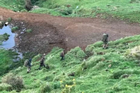 The video apparently showed Marokopa fugitive Tom Phillips and his three children walking through the bush. Photo: RNZ/Screenshot