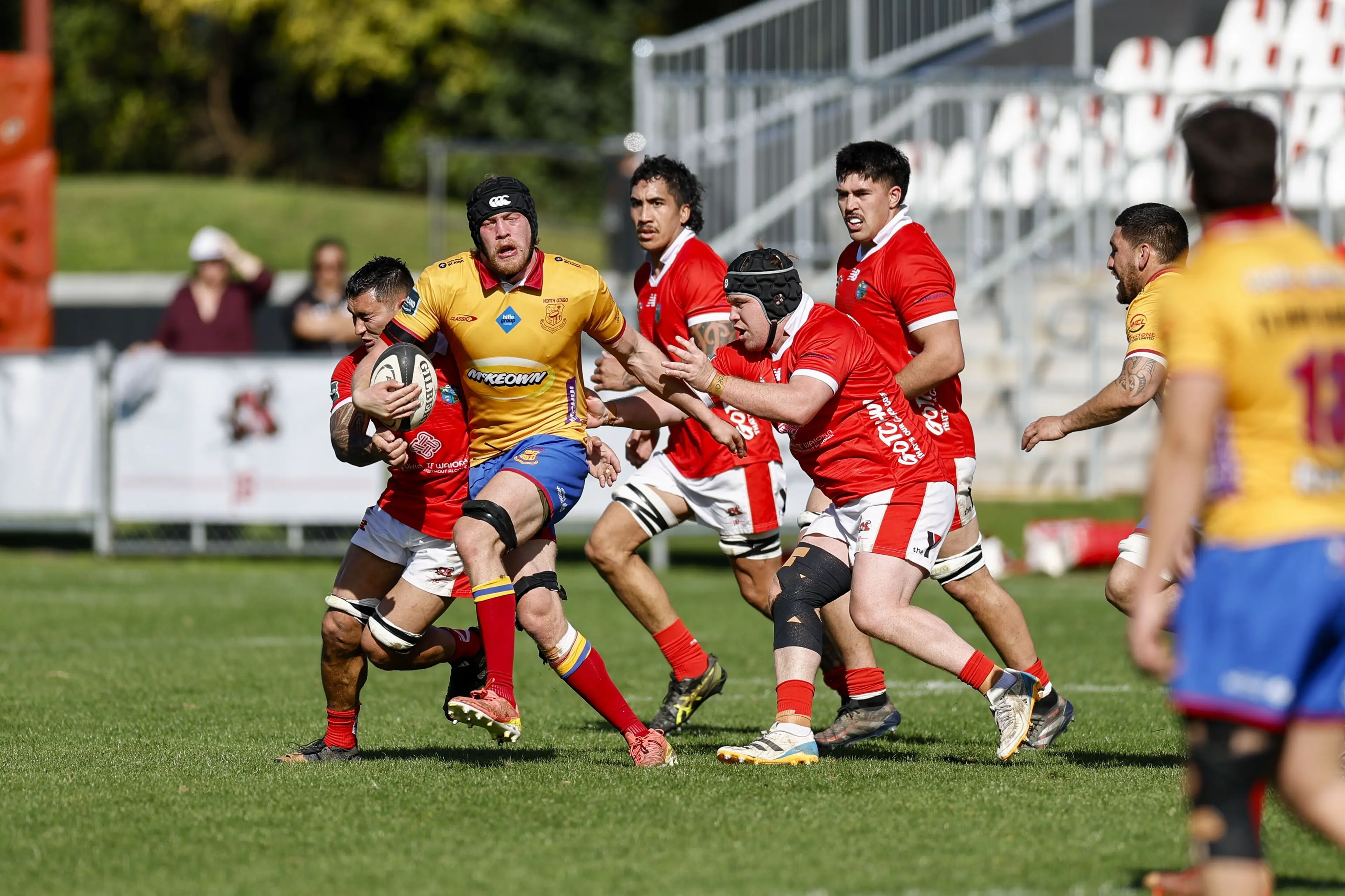North Otago lock Corban Agar tries to get clear of the Poverty Bay defence during a Heartland Championship game this season. Photo: NZ Rugby/Smartframe