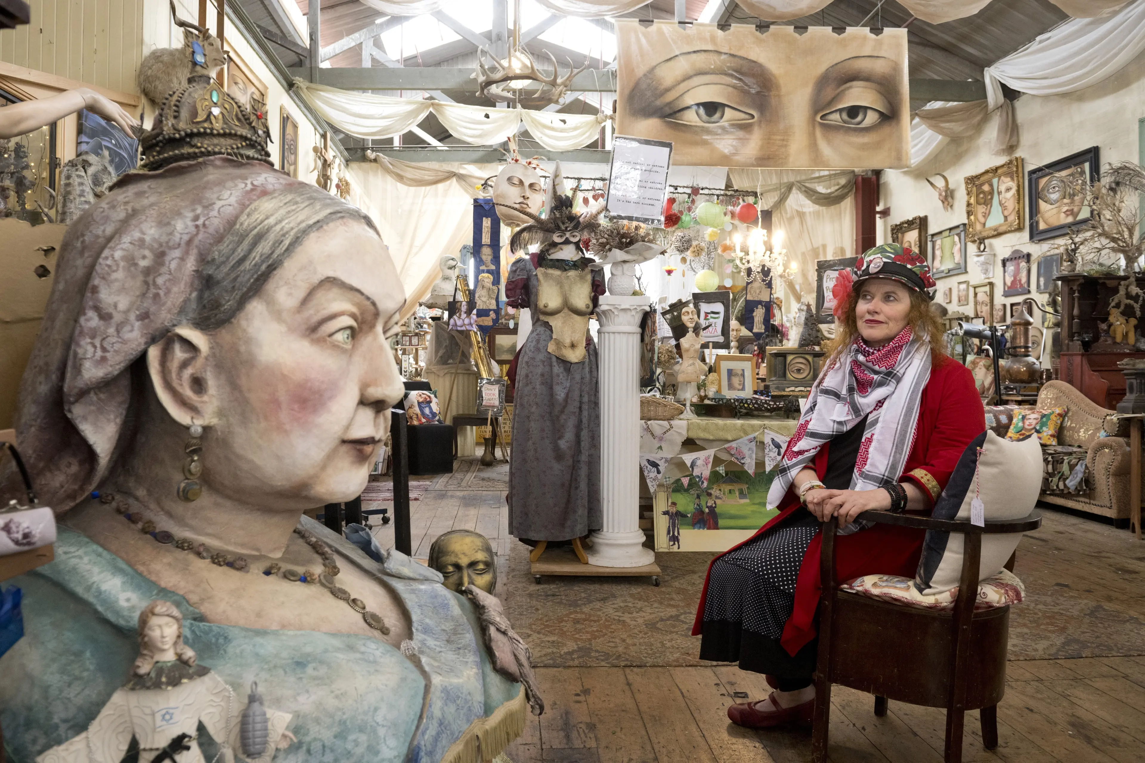Donna Demente sits in her gallery. PHOTO: GERARD O\\'BRIEN