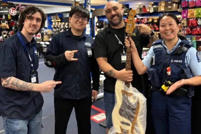 The image posted on a police Facebook page, featuring an AI-manipulated guitar. Photo: NZ police/screenshot