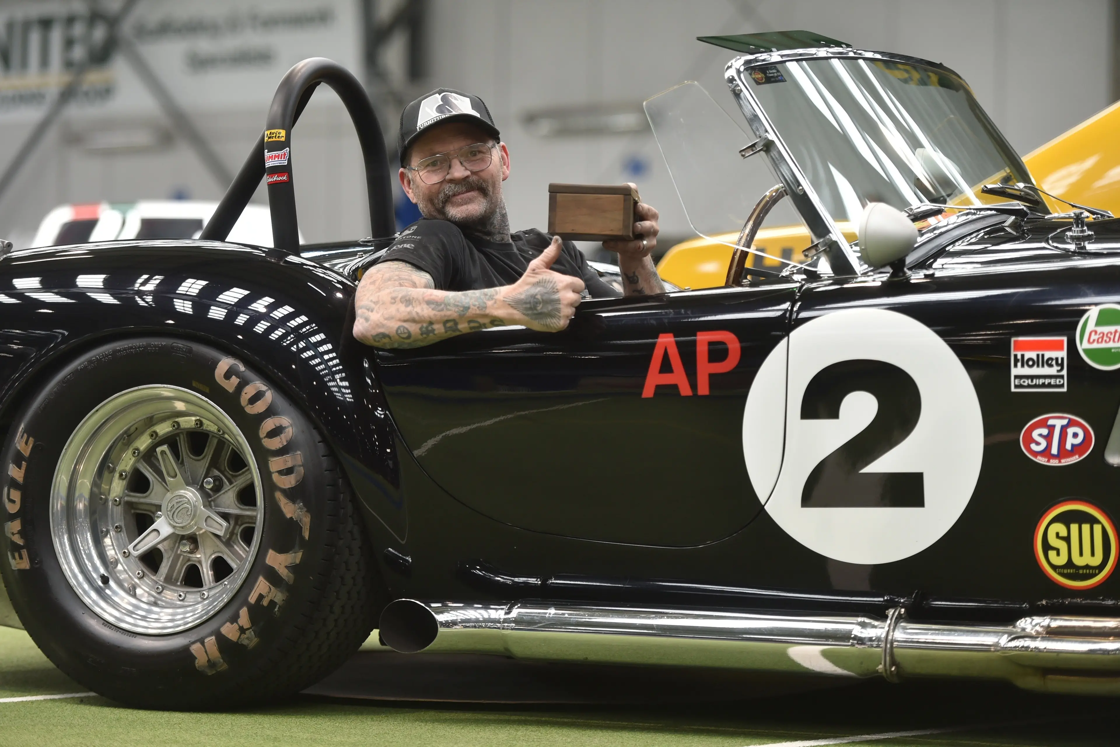 Aaron Aitcheson, of Dunedin, in his Shelby Cobra replica.Photo: Gregor Richardson