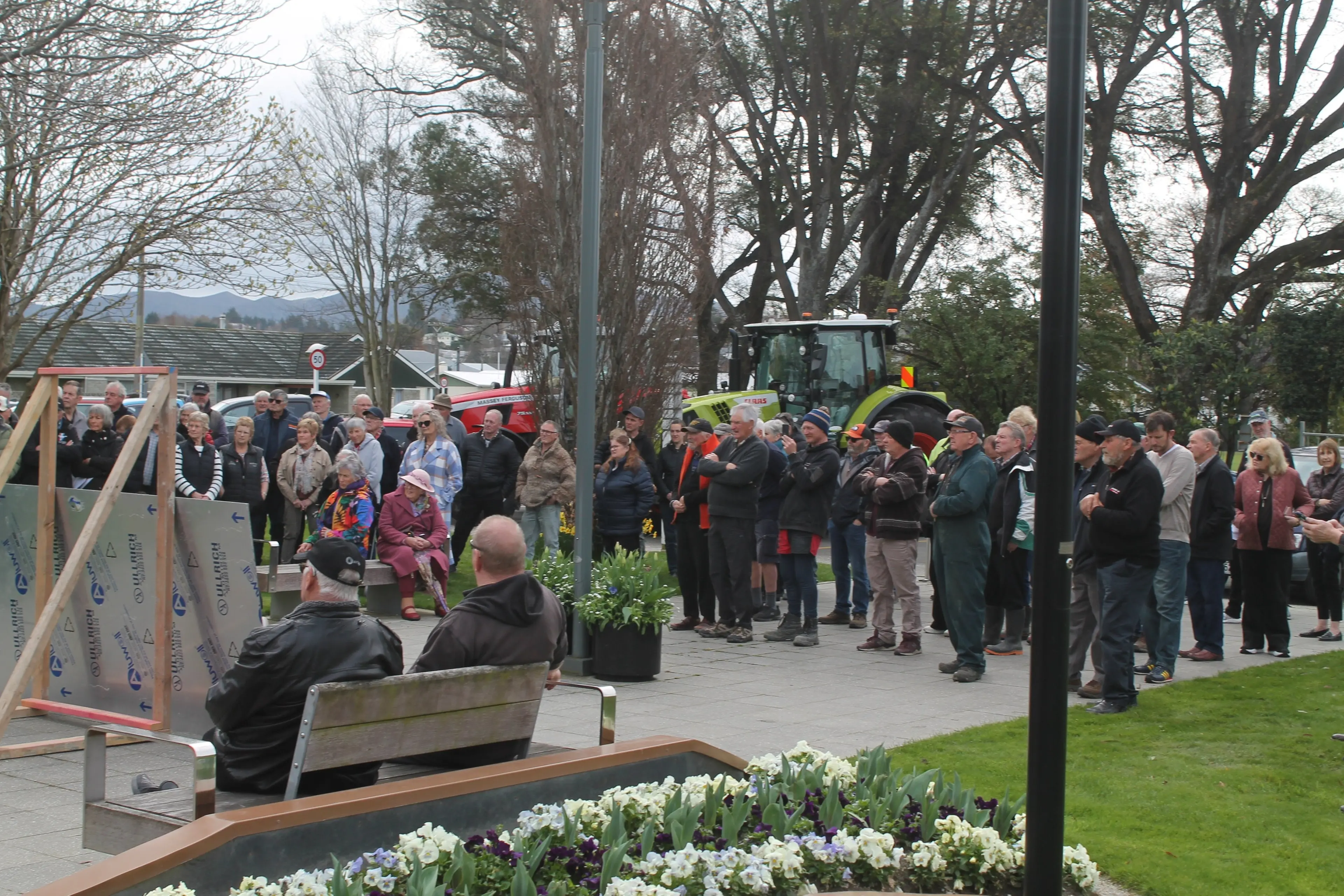 A crowd gathers outside the Gore District Council building to protest flood rule changes. Photo: Gerrit Doppenberg