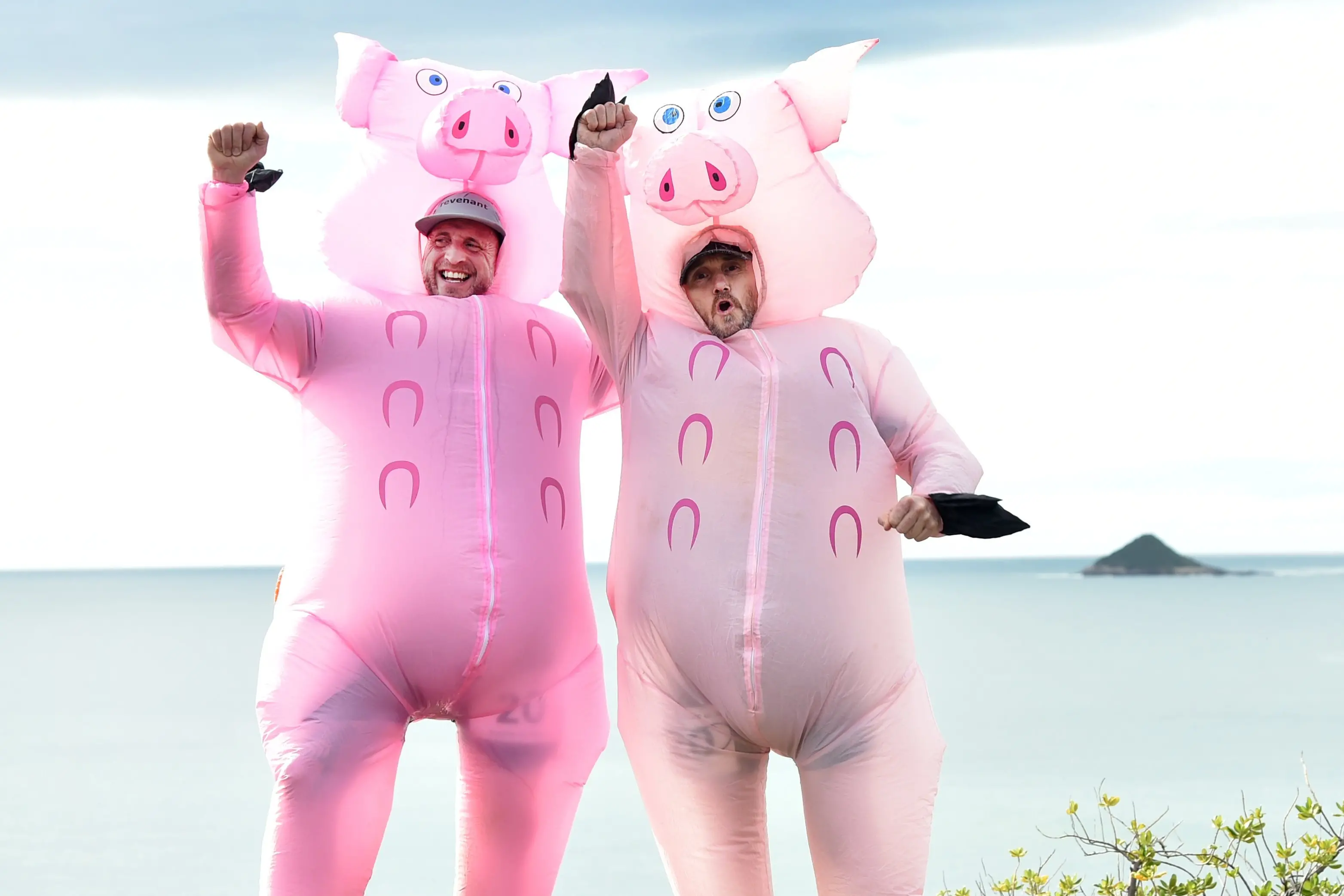 Brighton Backyard Ultra participants  Chris Taylor (left) and Steve Tripp on the first lap of the course donning pig suits. Photo: Peter McIntosh