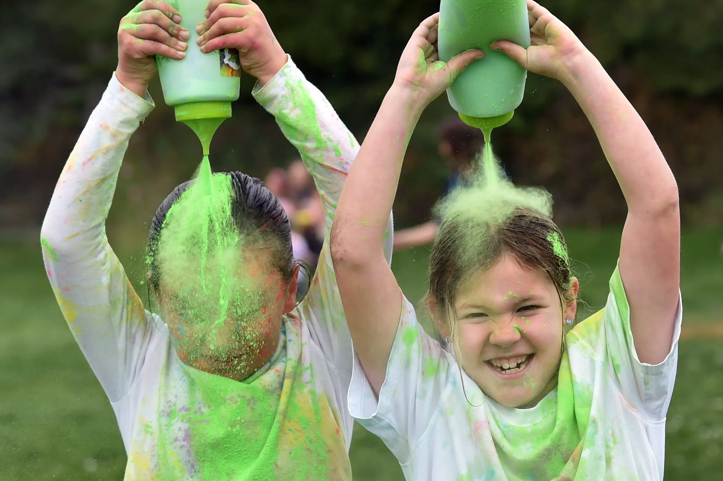 Painting themselves green during Andersons Bay School\\'s colour run on Saturday were Gabriella Capece (left) and Ruby Keogh, both 8. Photo: Peter McIntosh