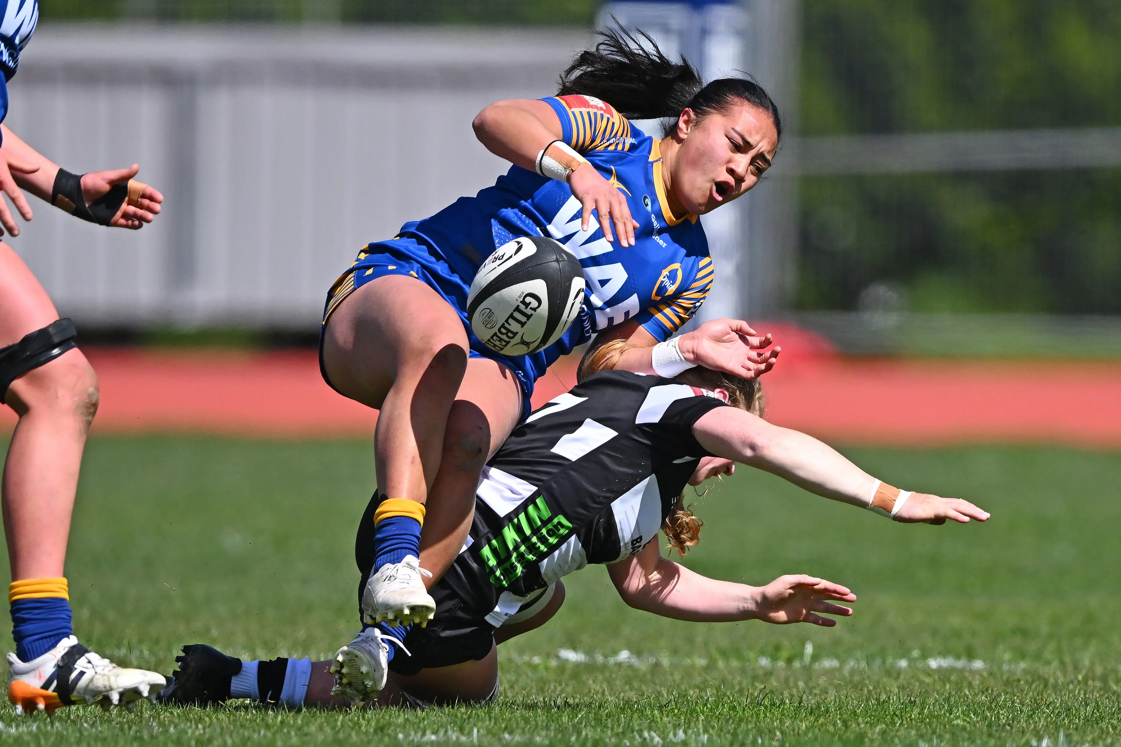Otago Spirit second five Naomi Sopoaga clatters into Hawke\\'s Bay defender Kate Donald during the Farah Palmer Cup game in Hastings on Sunday. Photo: NZ Rugby/Smartframe