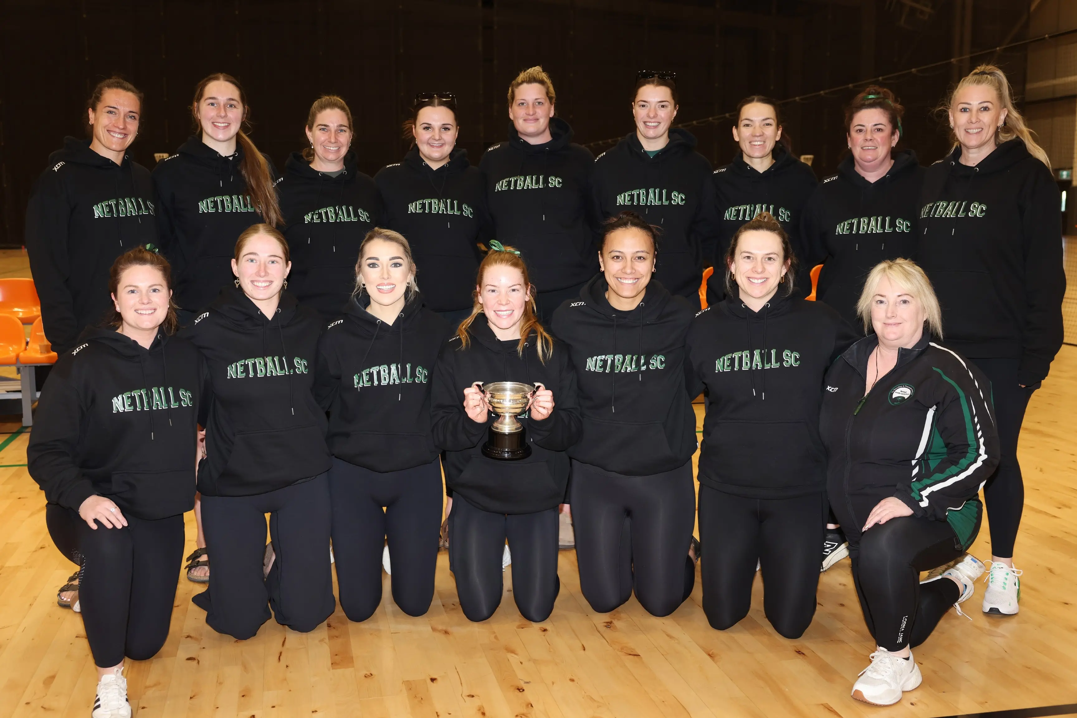 South Canterbury senior women representative netball team celebrate with the Gisborne Cup after a successful outing at the Netball New Zealand Open. Photo: Supplied