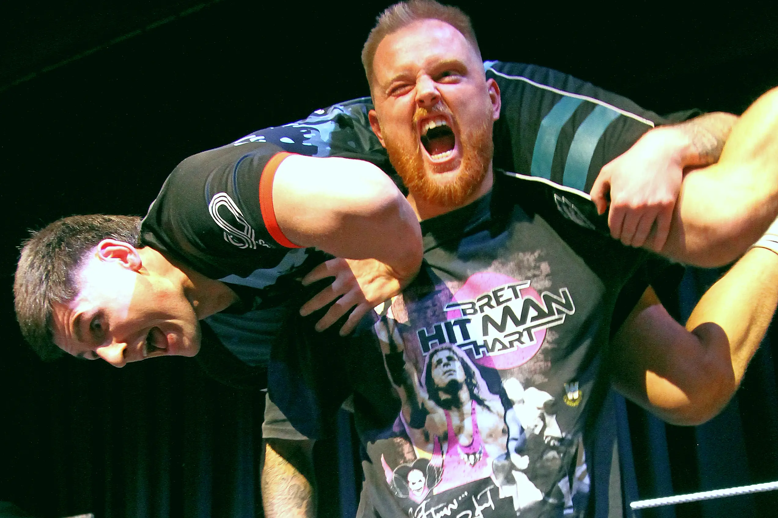 Wrrestlers JK Moody, left, and Jacko found their fight-night motivation while warming up muscles - and voices - at TP\\u014CMA on Saturday. Photo: Nick Brook