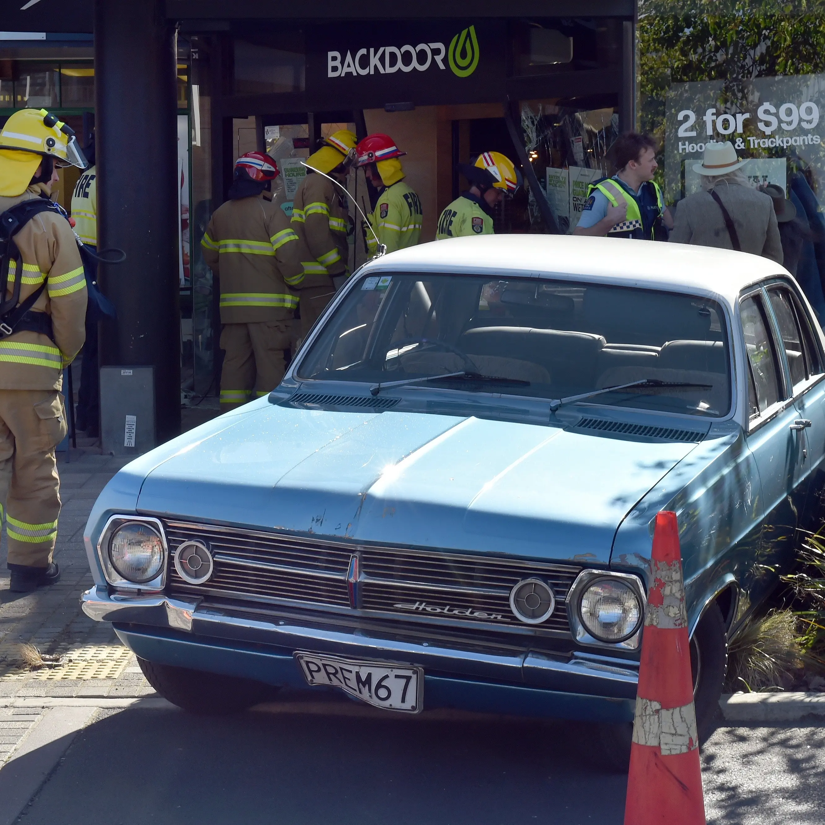 Car smashes into front window of Backdoor shop