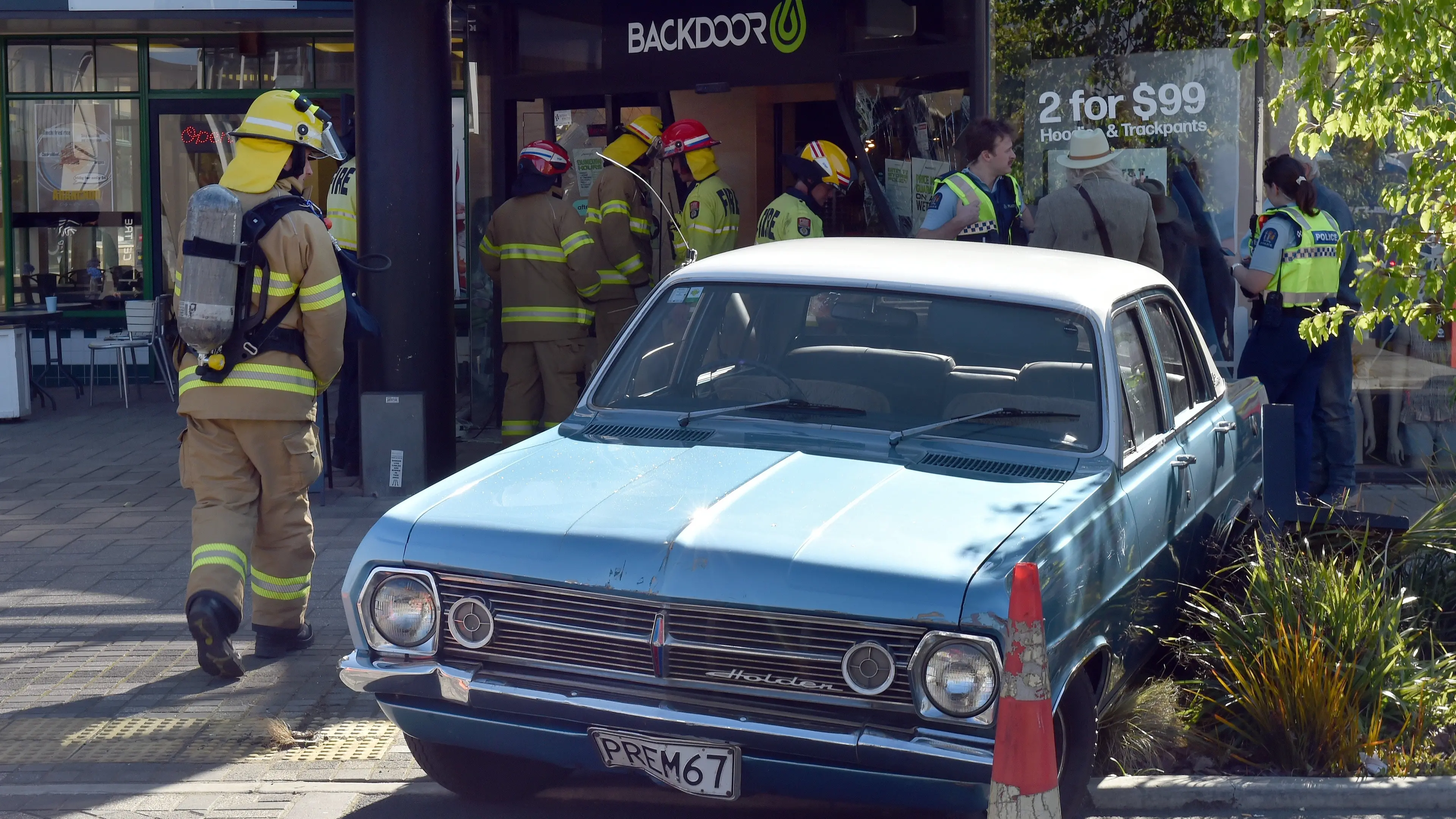 Car smashes into front window of Backdoor shop