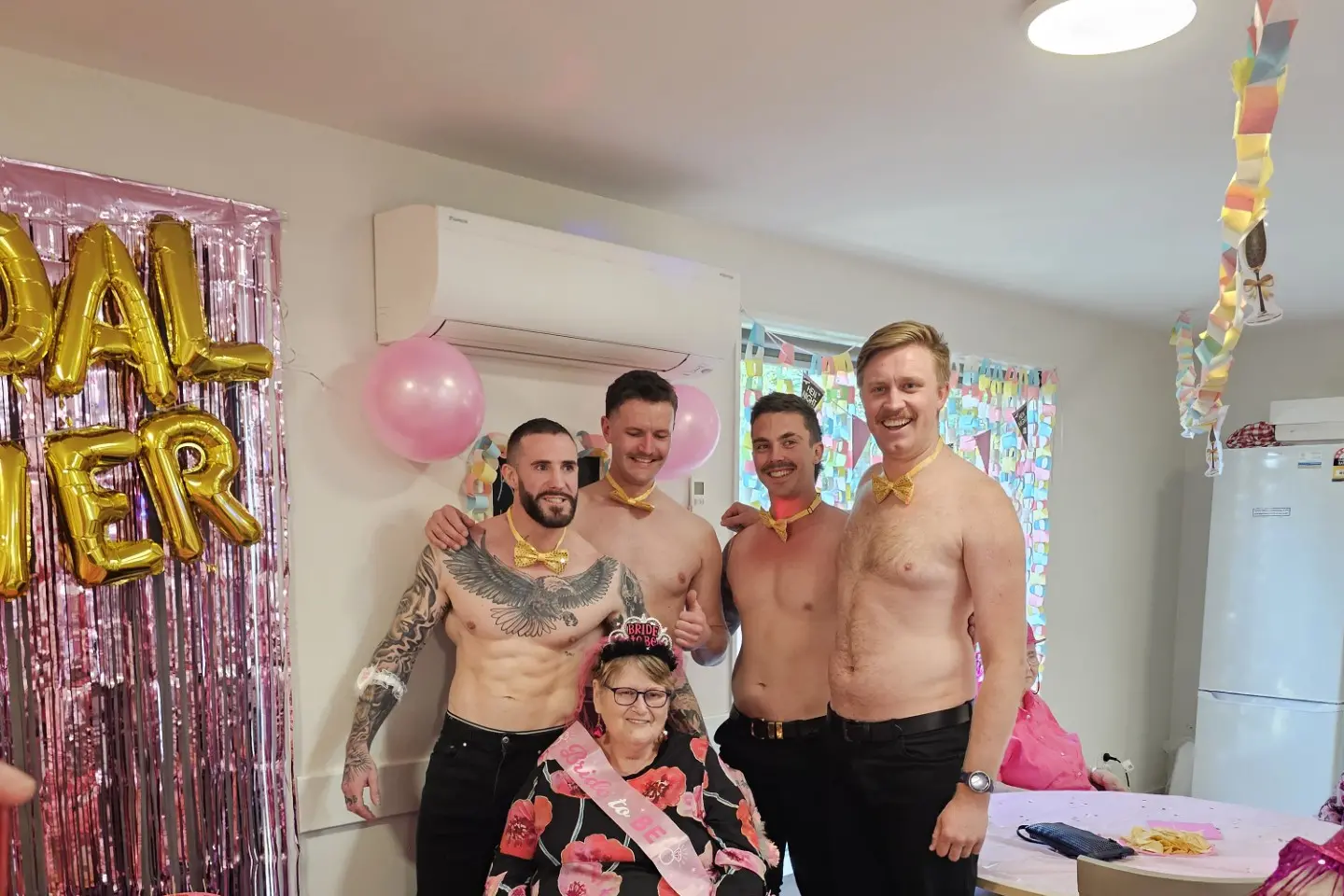 Party time . . . Oliver Davidson (left), Jabob Leo Skilling, Patric Stokes and Bailey Moore with the bride-to-be Penny Price. Photo: Supplied