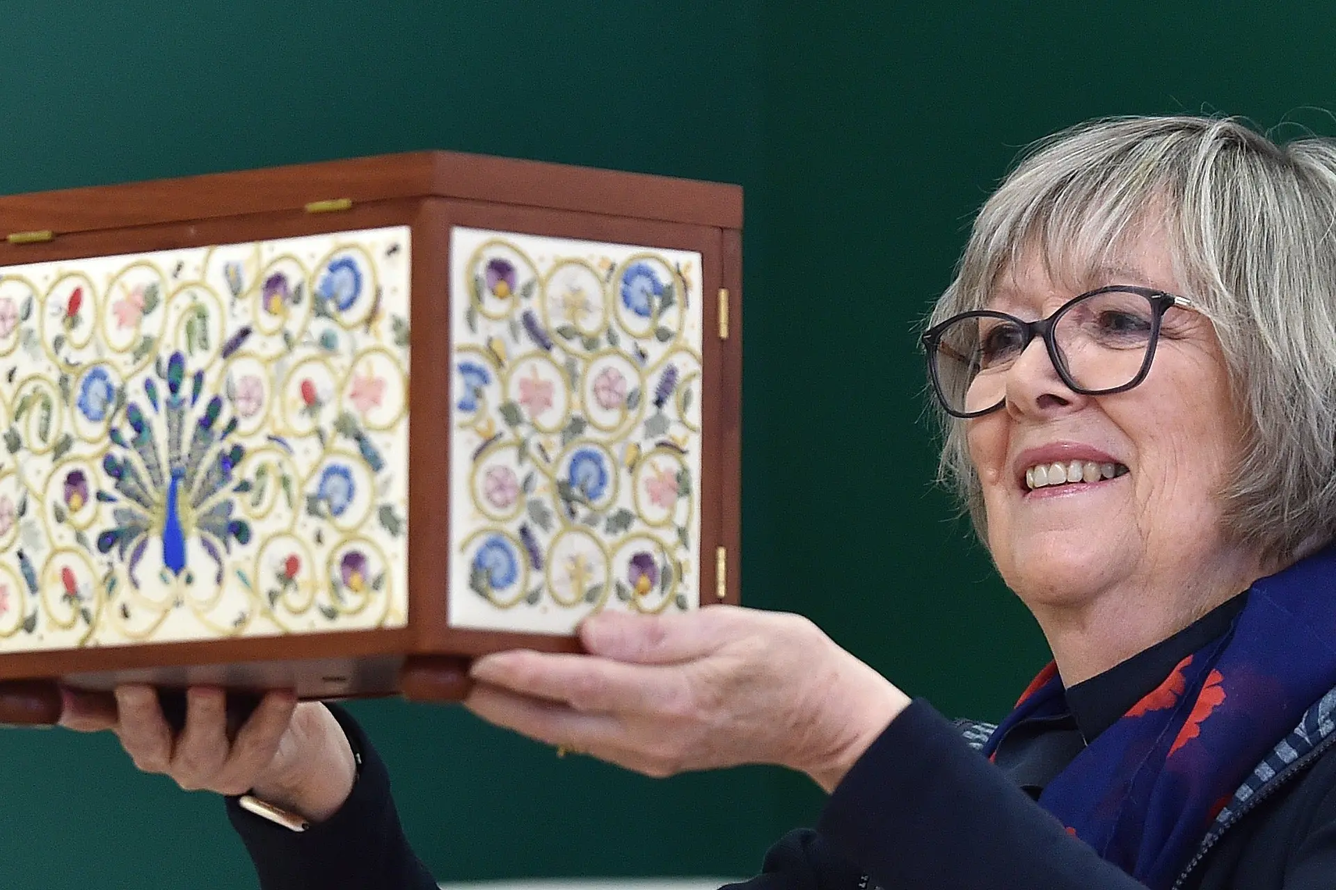 Otago Embroiders\\' Guild member Gaynor Chronican, of Dunedin, holds her Elizabethan embroidered casket during the guild\\'s exhibition at the Dunedin Community Gallery on Monday. Photo: Peter McIntosh