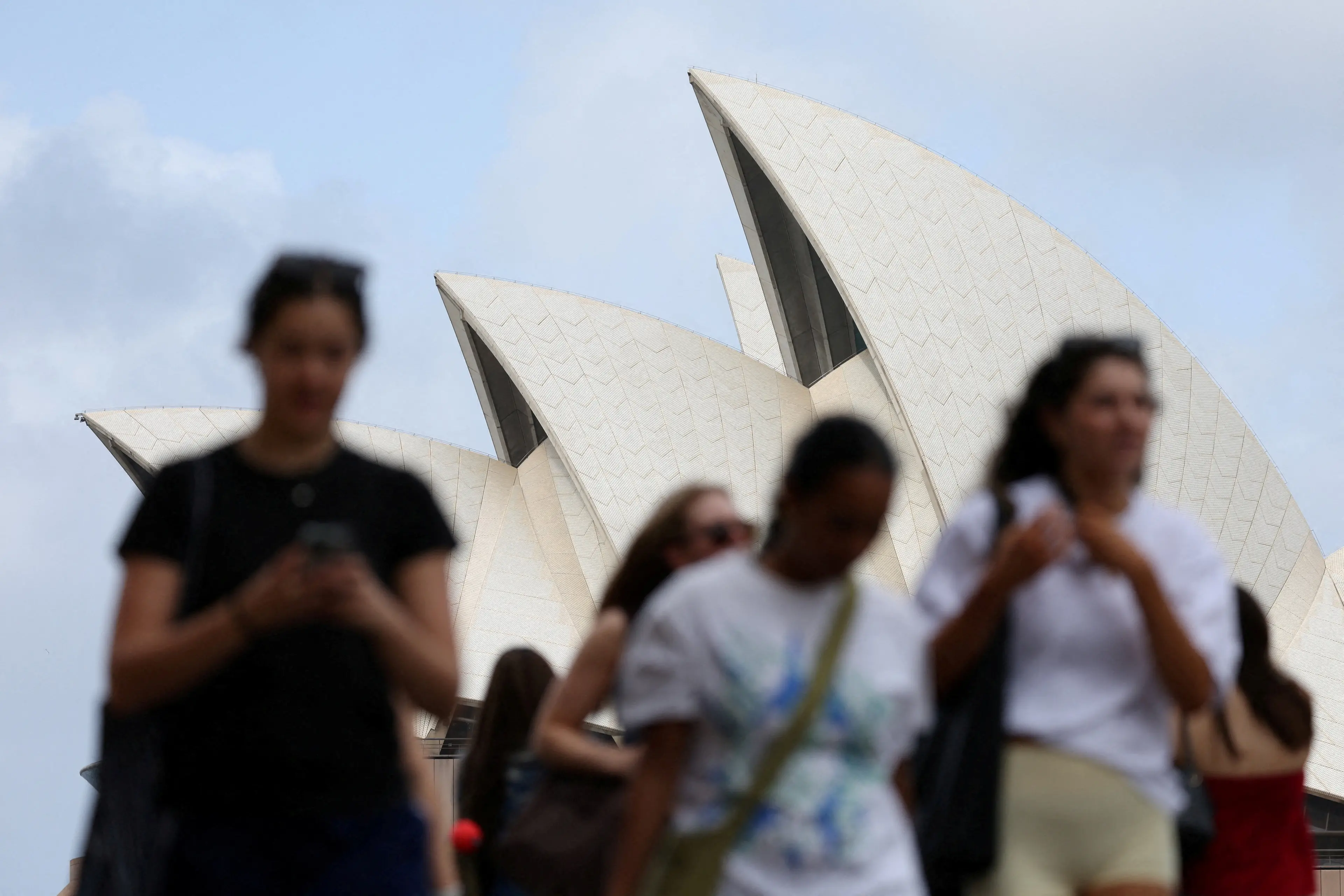 The Treasury expects population growth in Australia to slow to 0.9% a year over the next four decades as fertility rates decline and net overseas migration continues to slow. Photo: Reuters