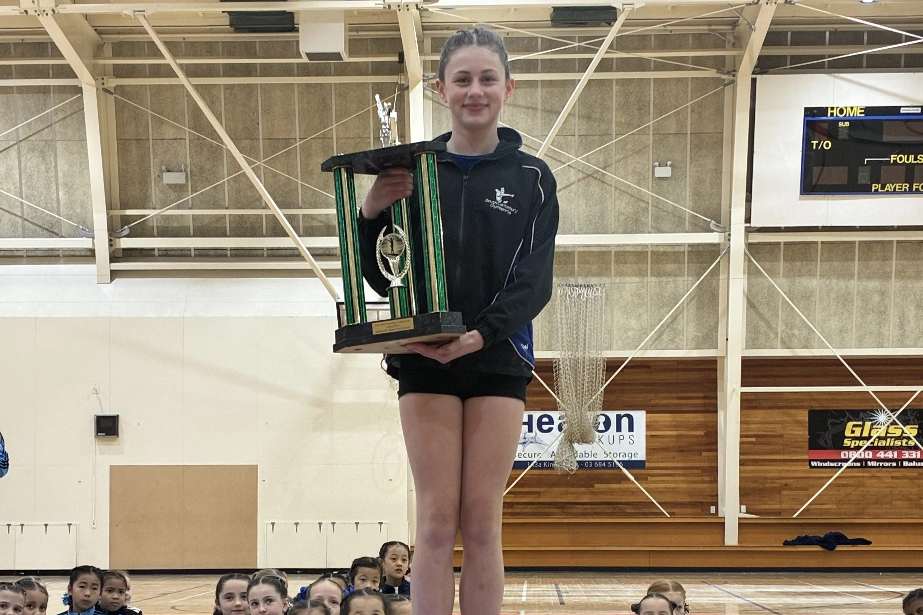 Eden Wilson (12) celebrates winning the Fransch Trophy at the recent South Island Artistic Champs. Photo: Supplied