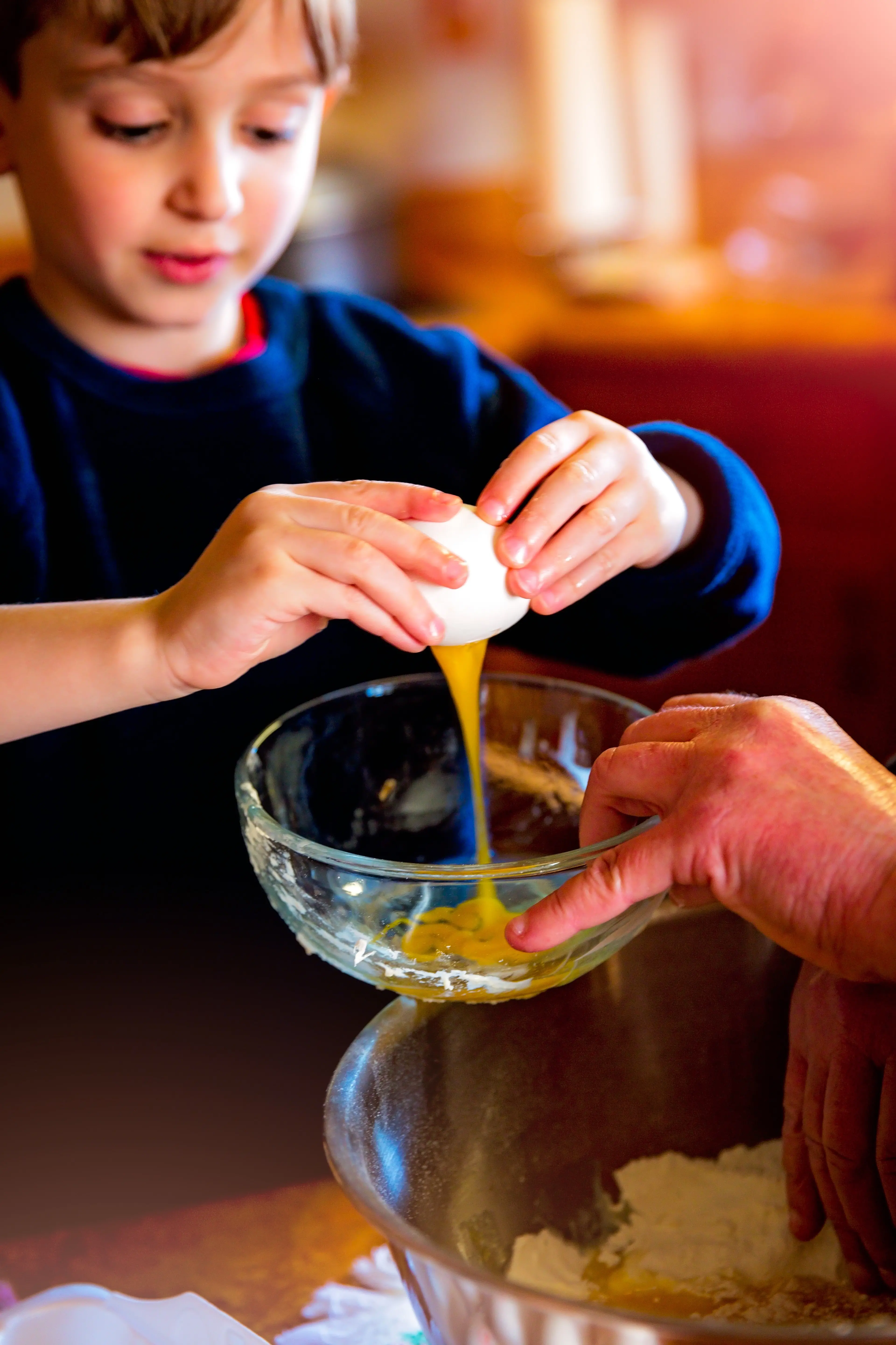 School holidays can provide the opportunity for your child to help learn about planning and cooking meals at home. Photo: Allied Media files