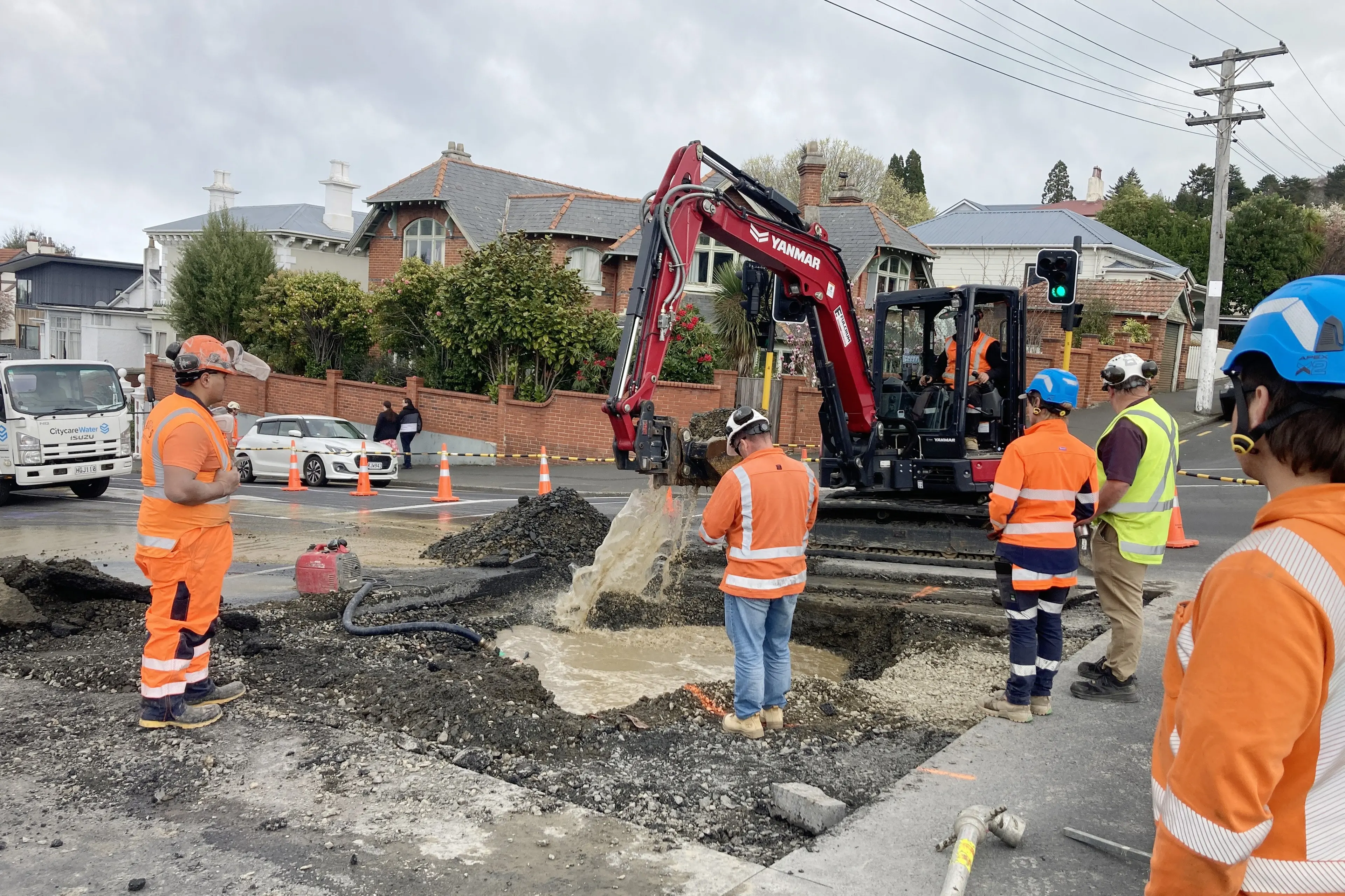 Contarctors work to repair a water leak in Stuart St. Photo: Stephen Jaquiery