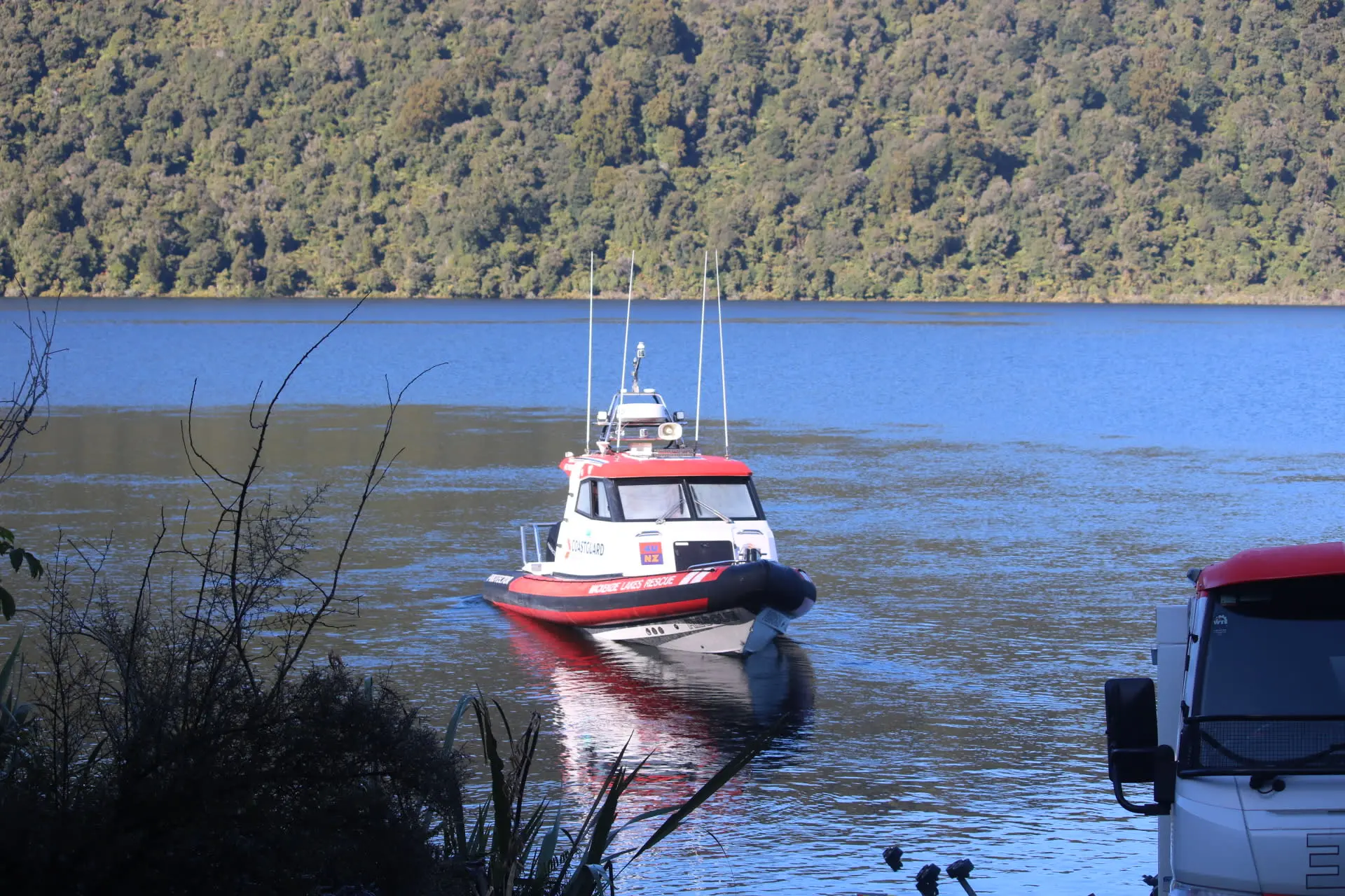 <p>The search team deployed sonar equipment from a Coastguard boat in Lake Moeraki. Photo: RNZ</p>\\n