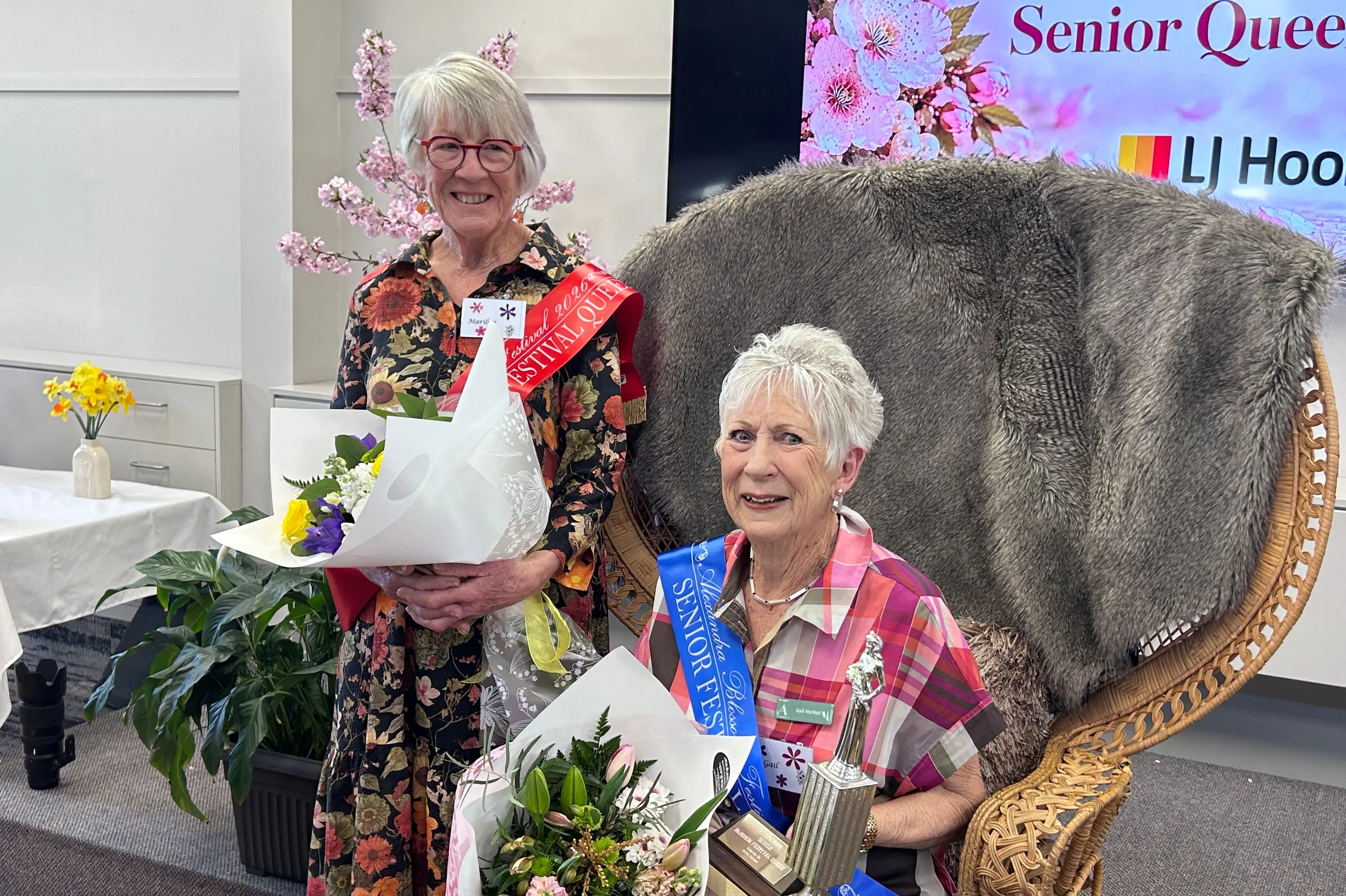 Celebrating their success are the Alexandra Blossom Festival Queen 2026 Gail McNeil (seated) and runner-up Marilyn Bunce. Photo: Julie Asher