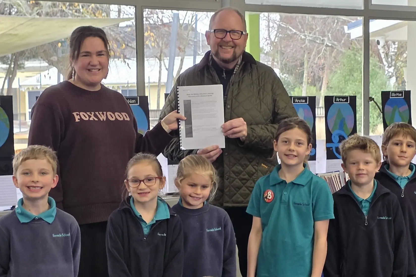 Taking a stand . . . Fernside School teacher Anita Ward and some of her Year 2/3 class presented a petition to Waimakariri Mayor Dan Gordon earlier this year. The students presented their petition to Environment Canterbury on Wednesday, September 23, calling for a bylaw to protect the wrybill during nesting season. Photo: Supplied