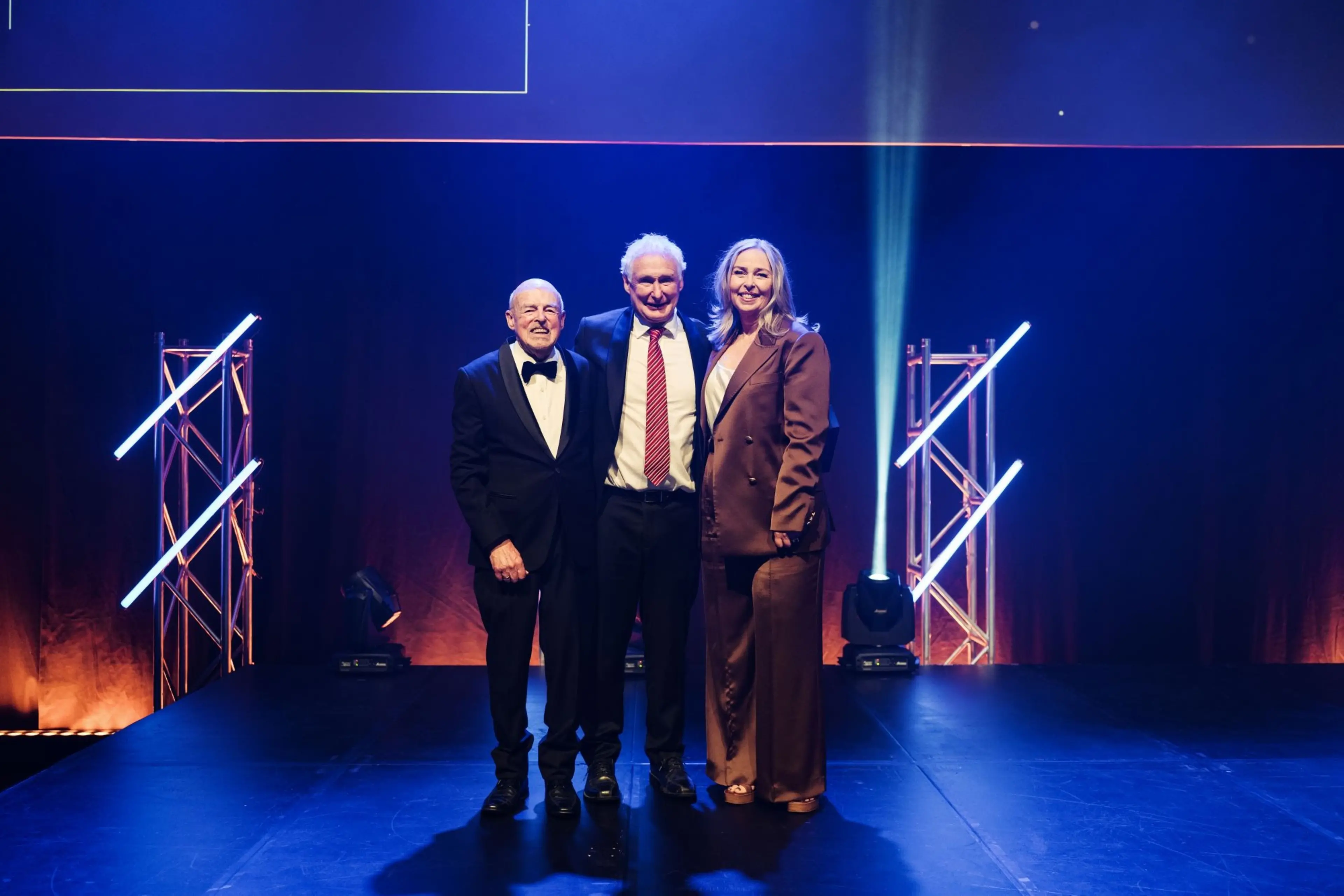 Chris Murdoch, centre, of Property Brokers Ashburton was named Individual Rural Salesperson of the Year at last week\\'s REINZ Awards of Excellence. He is pictured with REINZ life member Graham Crews and chief executive Lizzy Ryley. Photo Supplied