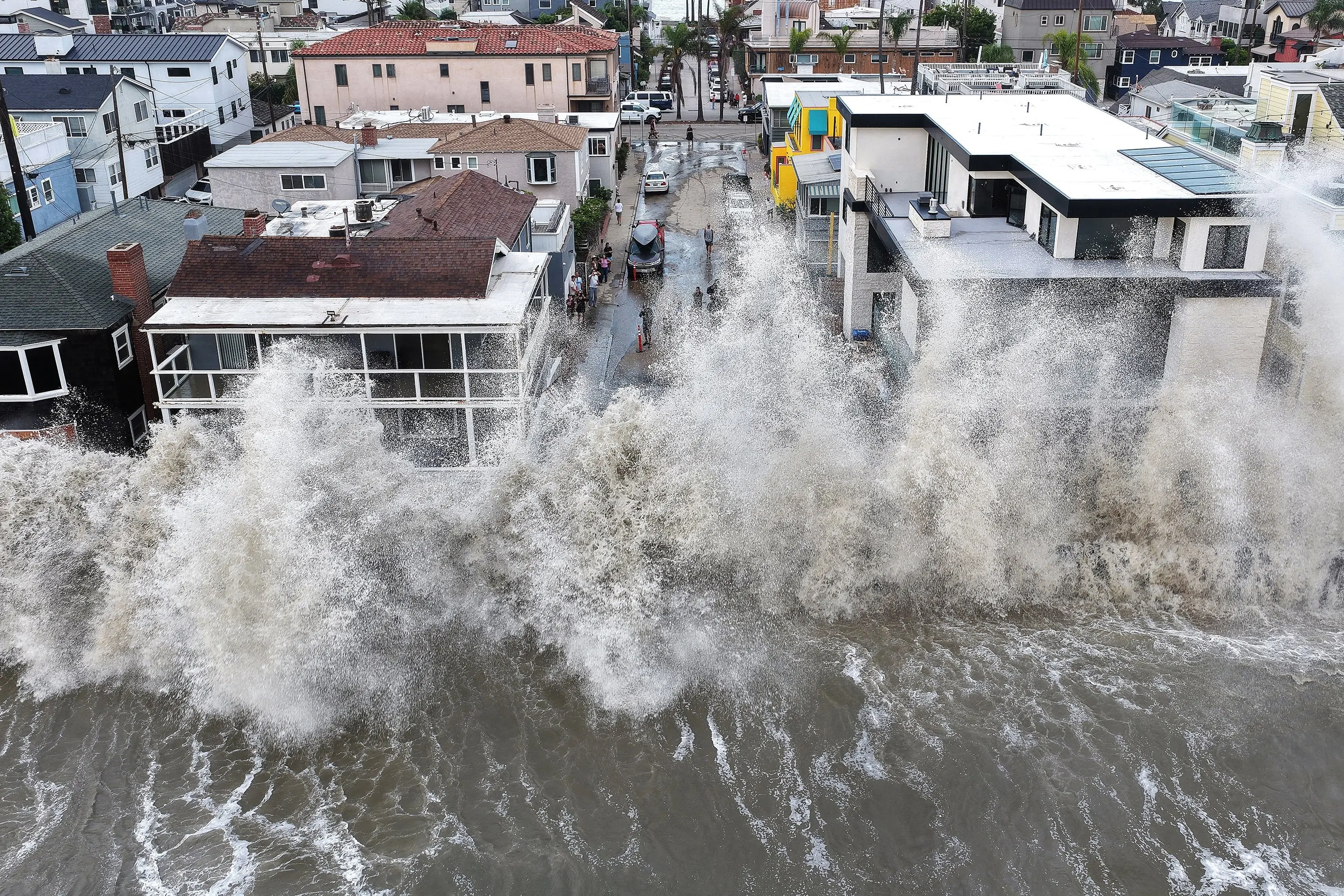Waves crash into a seawall protecting beachside homes in Long Beach, California last week. Heavy surf generated by offshore Hurricane Marie, amid record-breaking ocean heat and an emerging El Nino, caused flooding and forced evacuations. Photo: Getty Images