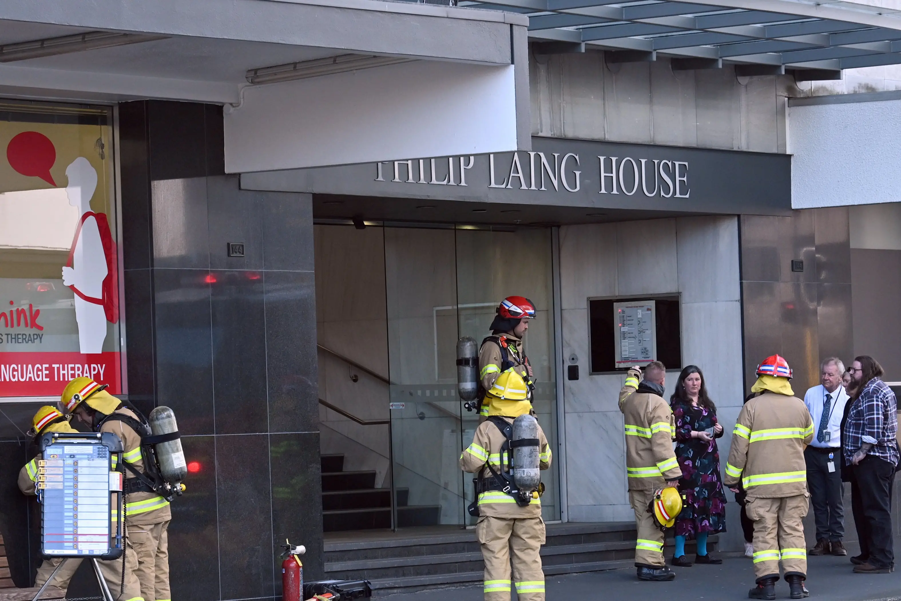 A Fire and Emergency NZ crew prepare to inspect a suspected gas leak at Philip Laing House on Thursday. Photo: Linda Robertson