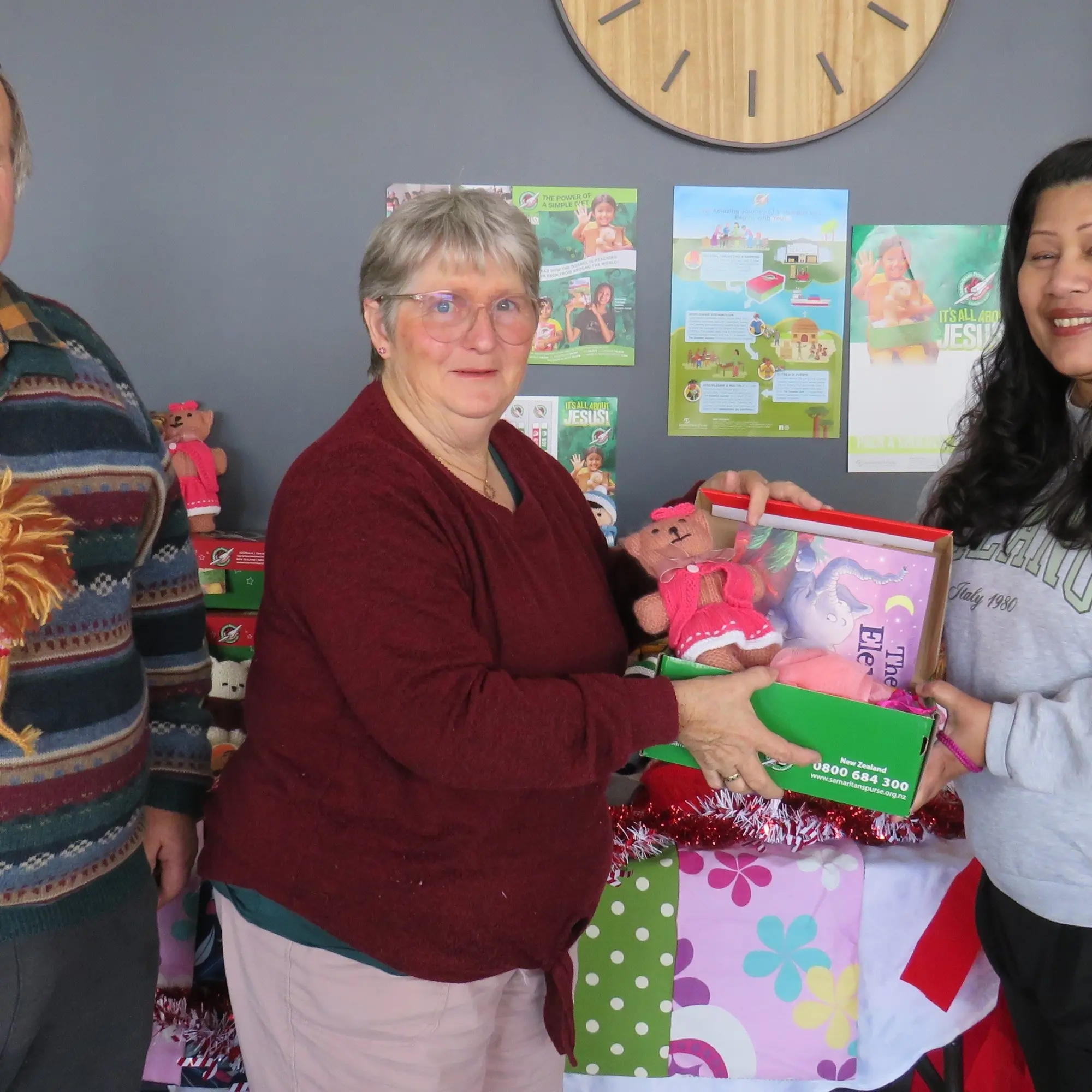 Shoeboxes filled with treats being assembled for Christmas