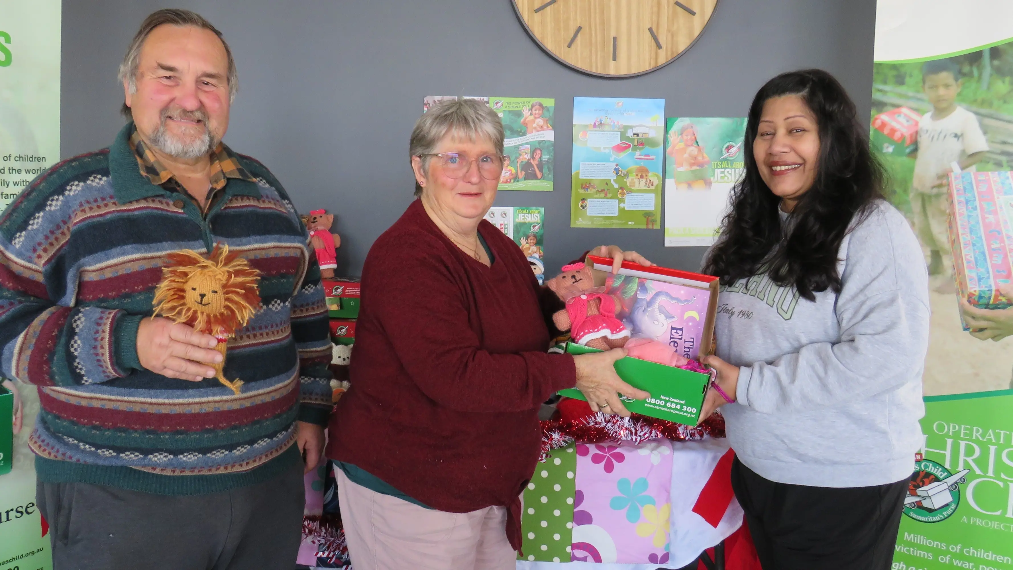 Shoeboxes filled with treats being assembled for Christmas
