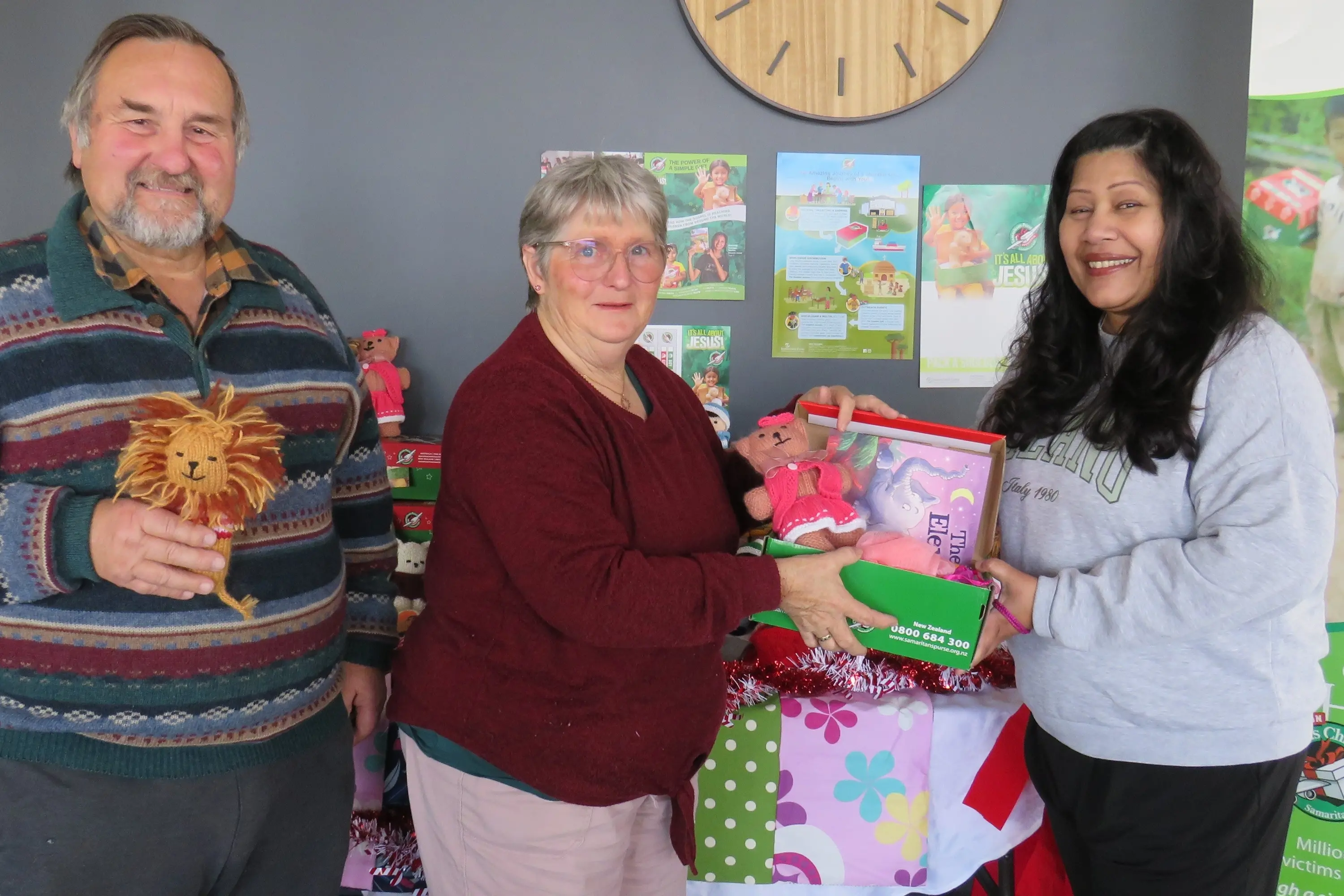 Ashburton co-ordinator\\'s of Operation Christmas Child Steve Hawkes (left), Rosie Hawkes (centre) and Amali Jayawardena who is a past receiptant of a Christmas box. Photo: Dellwyn Moylan