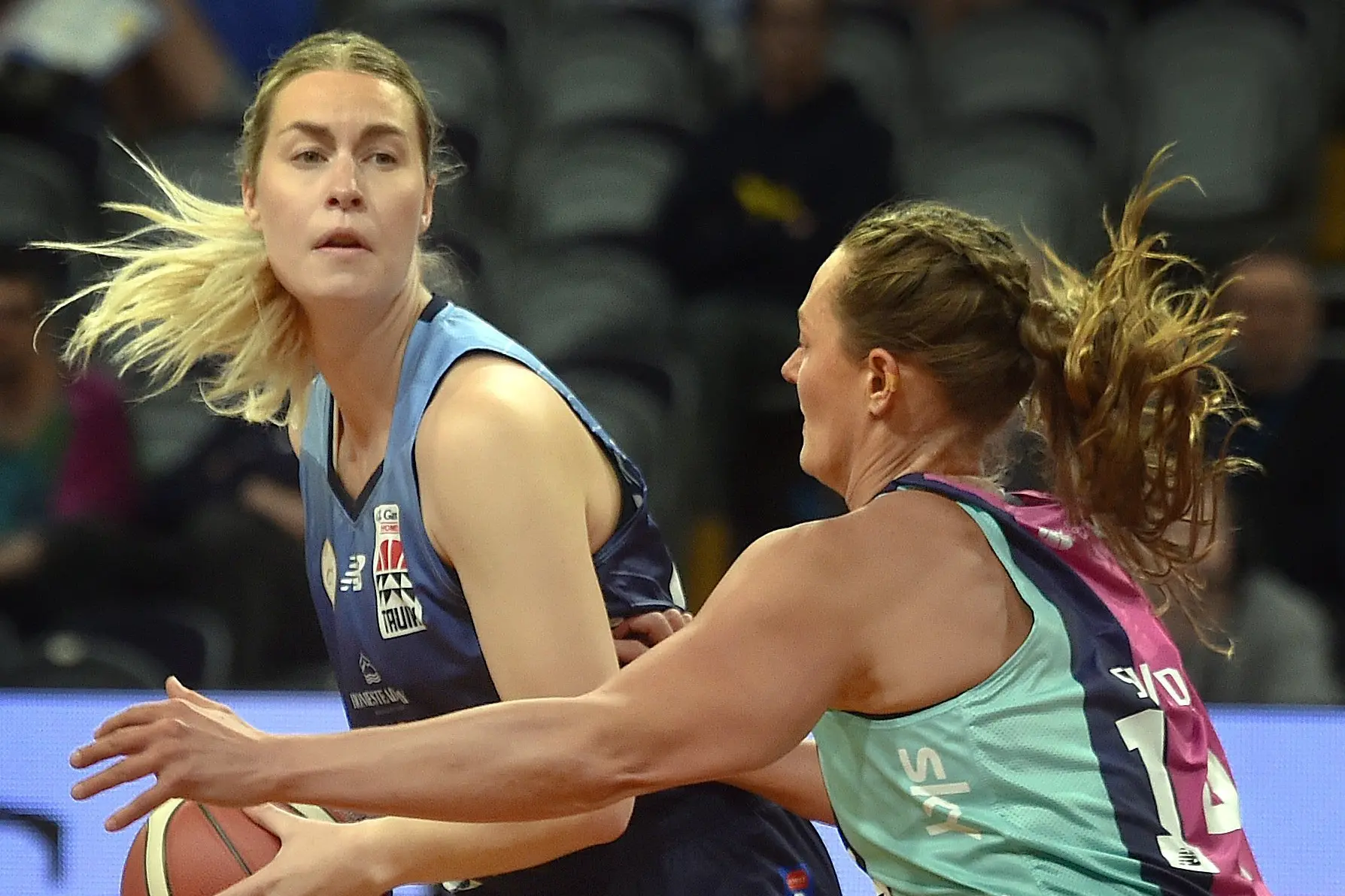 Southern Hoiho forward Zoe Richards looks for a pass around Whai defender Laina Snyder during a Tauihi league game in Dunedin last season. Photo: Peter McIntosh