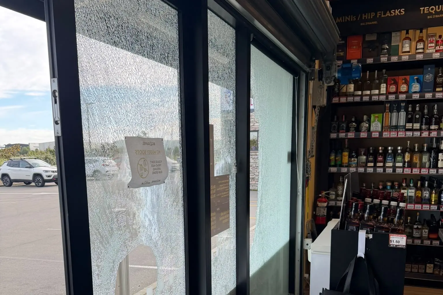 Hammer used to smash up liquor shop